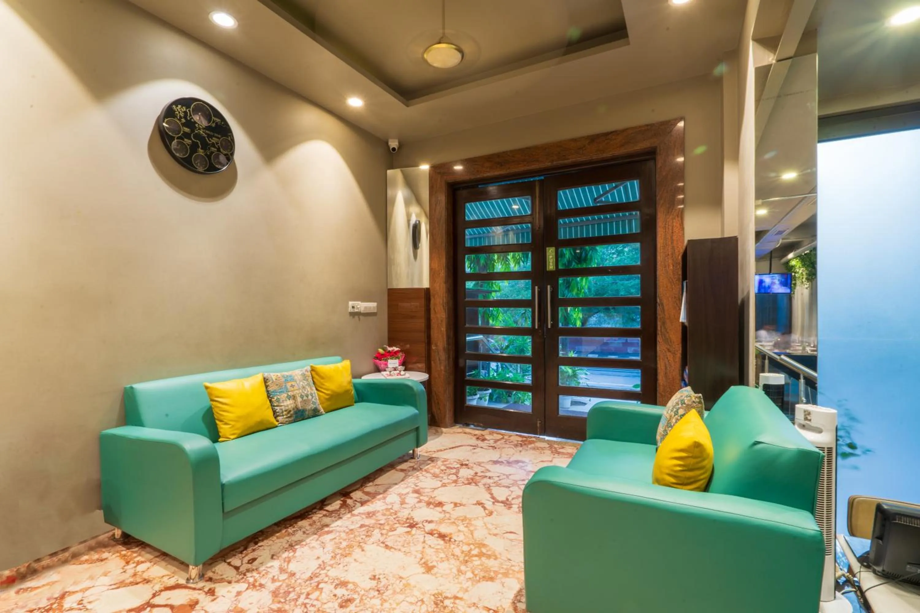 Lobby or reception in Cosy Grand, Chanakyapuri by The Cosy Hotels