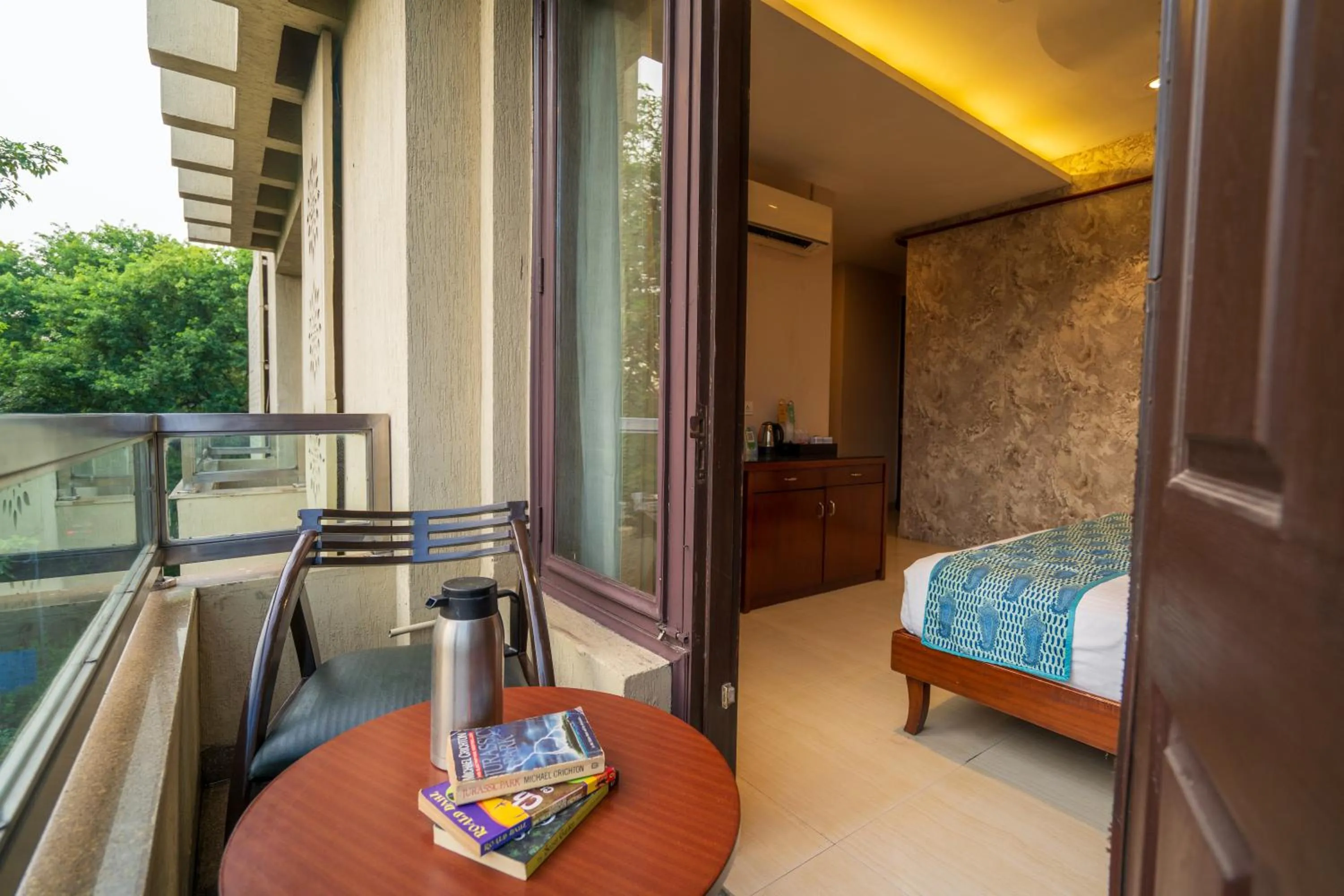 Balcony/Terrace, Bed in Cosy Grand, Chanakyapuri by The Cosy Hotels