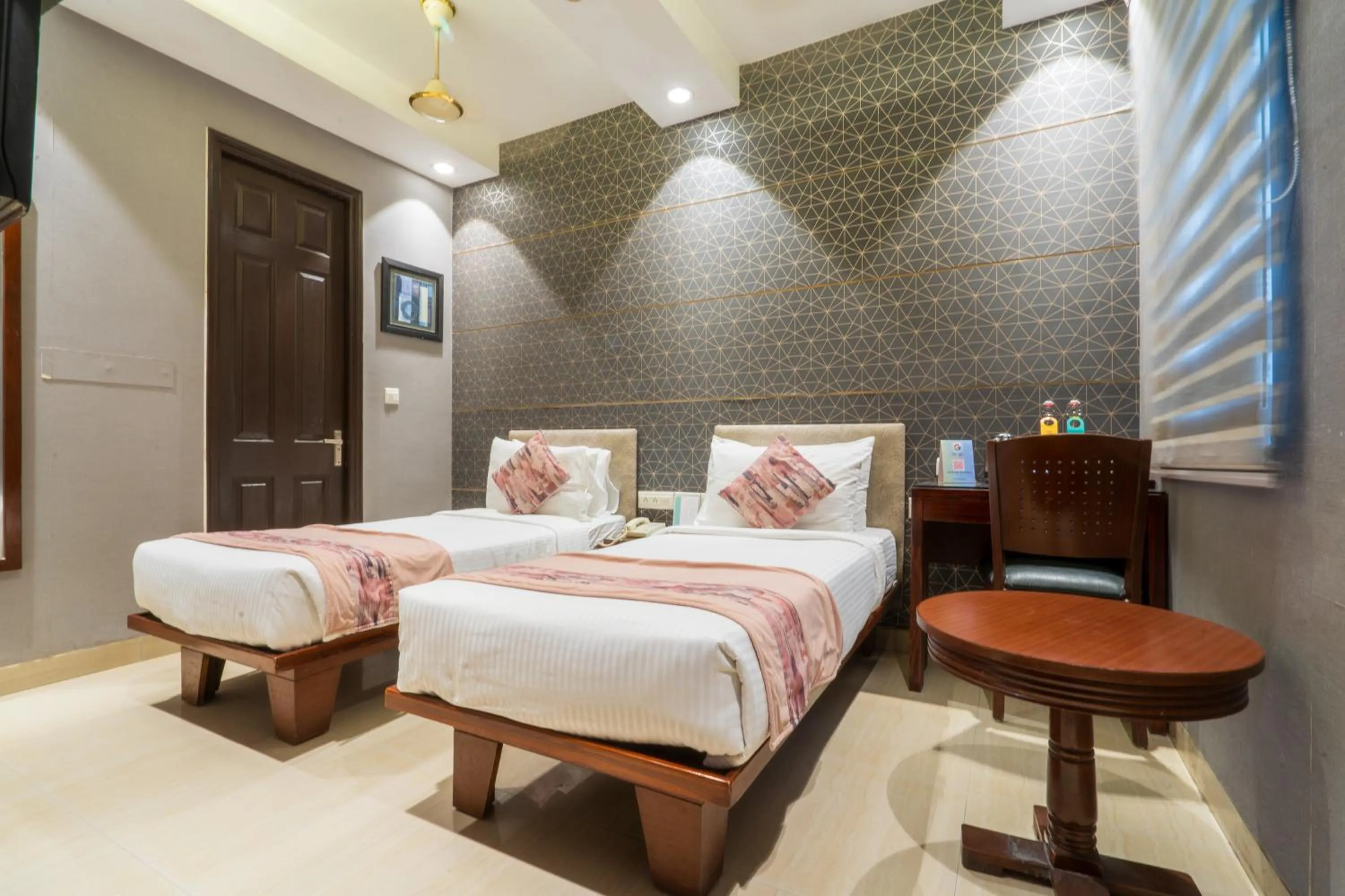 Bedroom, Bed in Cosy Grand, Chanakyapuri by The Cosy Hotels