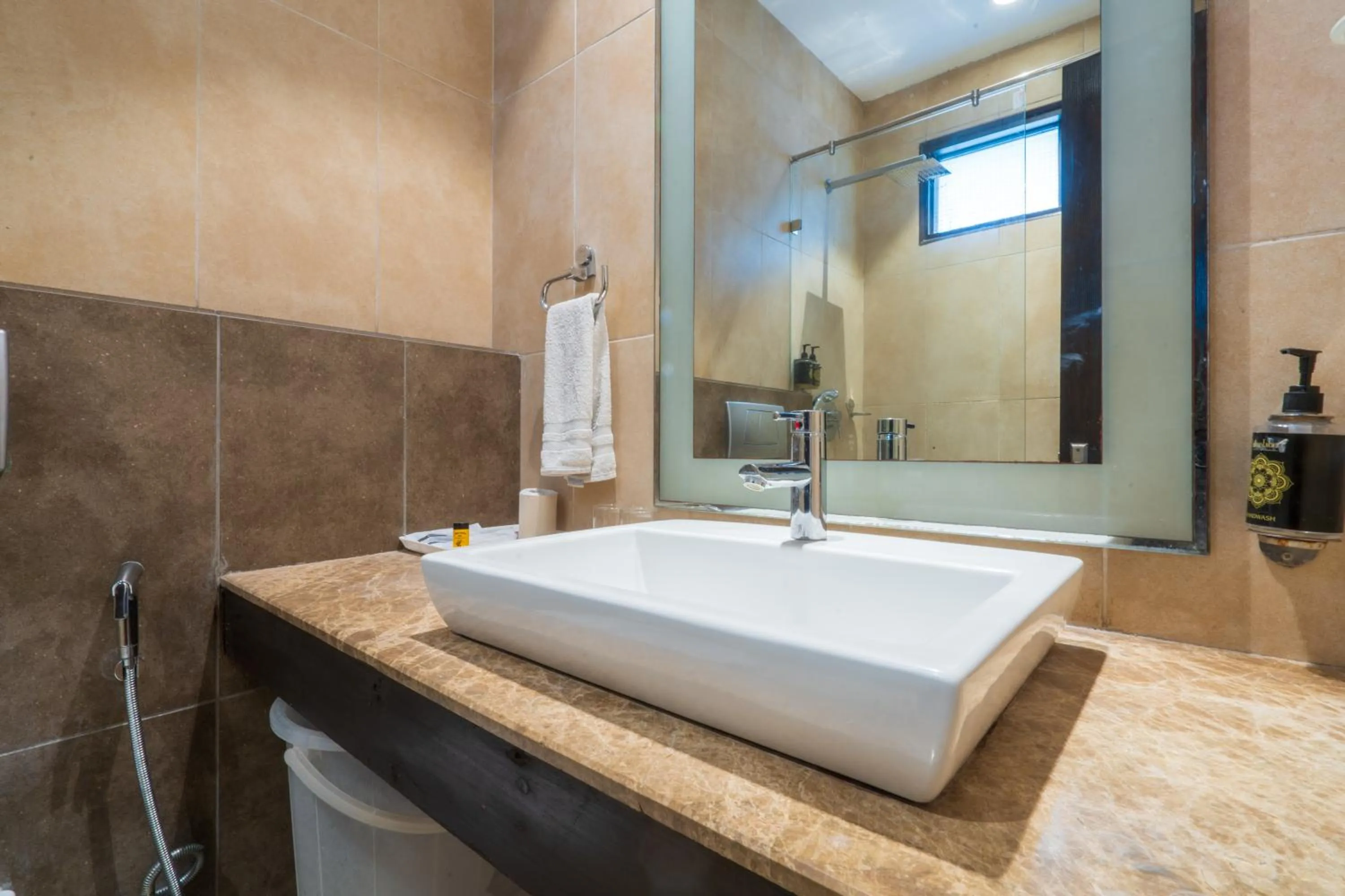 Bathroom in Cosy Grand, Chanakyapuri by The Cosy Hotels