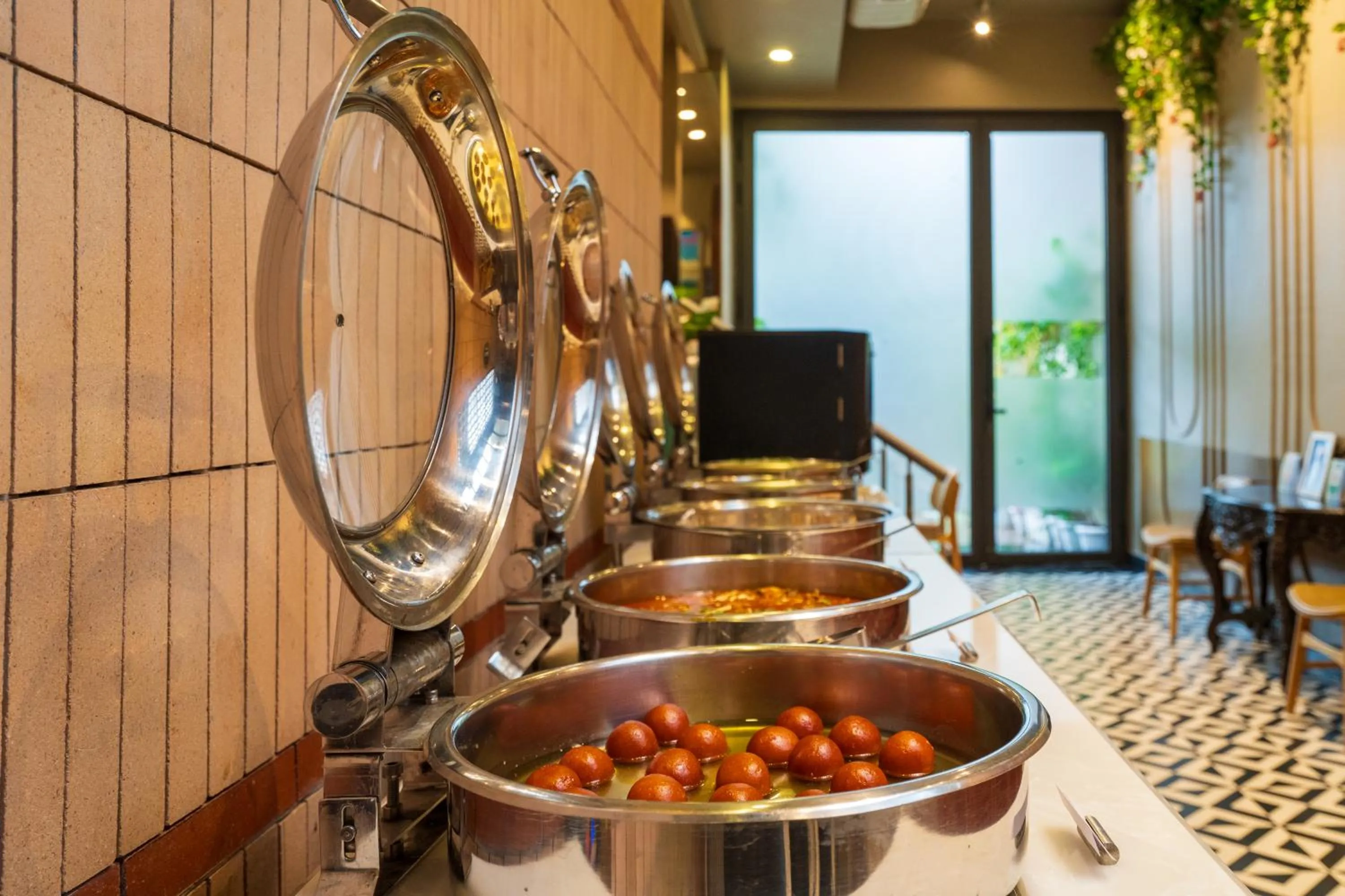 Restaurant/places to eat in Cosy Grand, Chanakyapuri by The Cosy Hotels