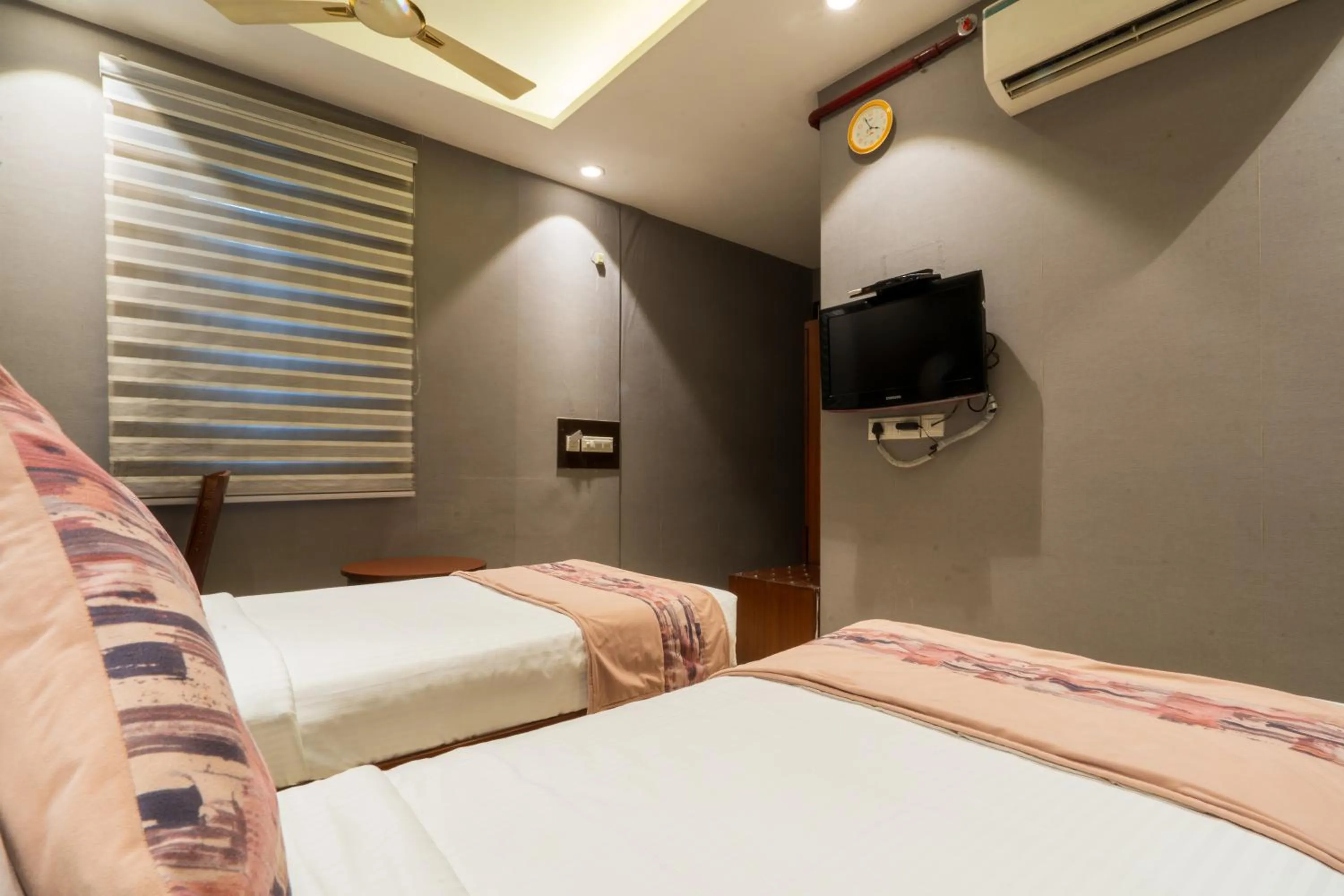 Bedroom, Bed in Cosy Grand, Chanakyapuri by The Cosy Hotels