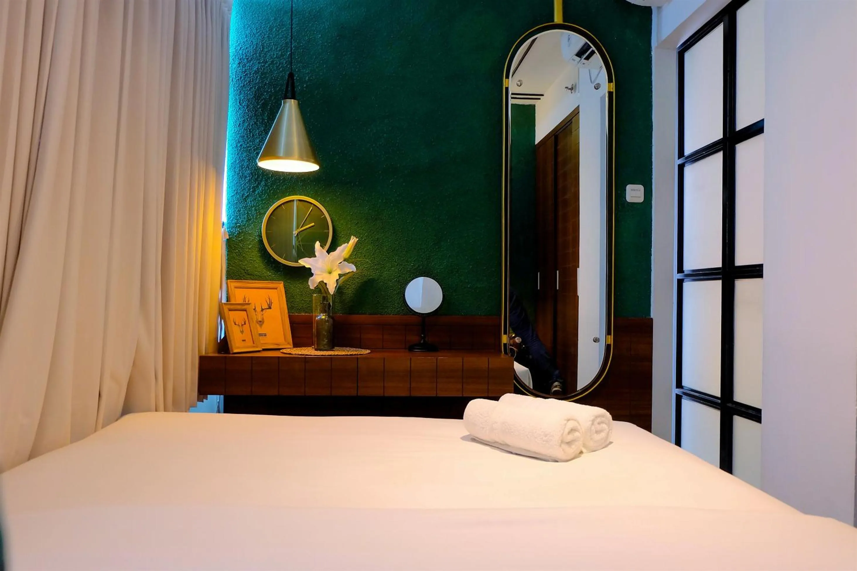 Bed in Modern and Stylish 2BR Pakubuwono Terrace Apartment By Travelio