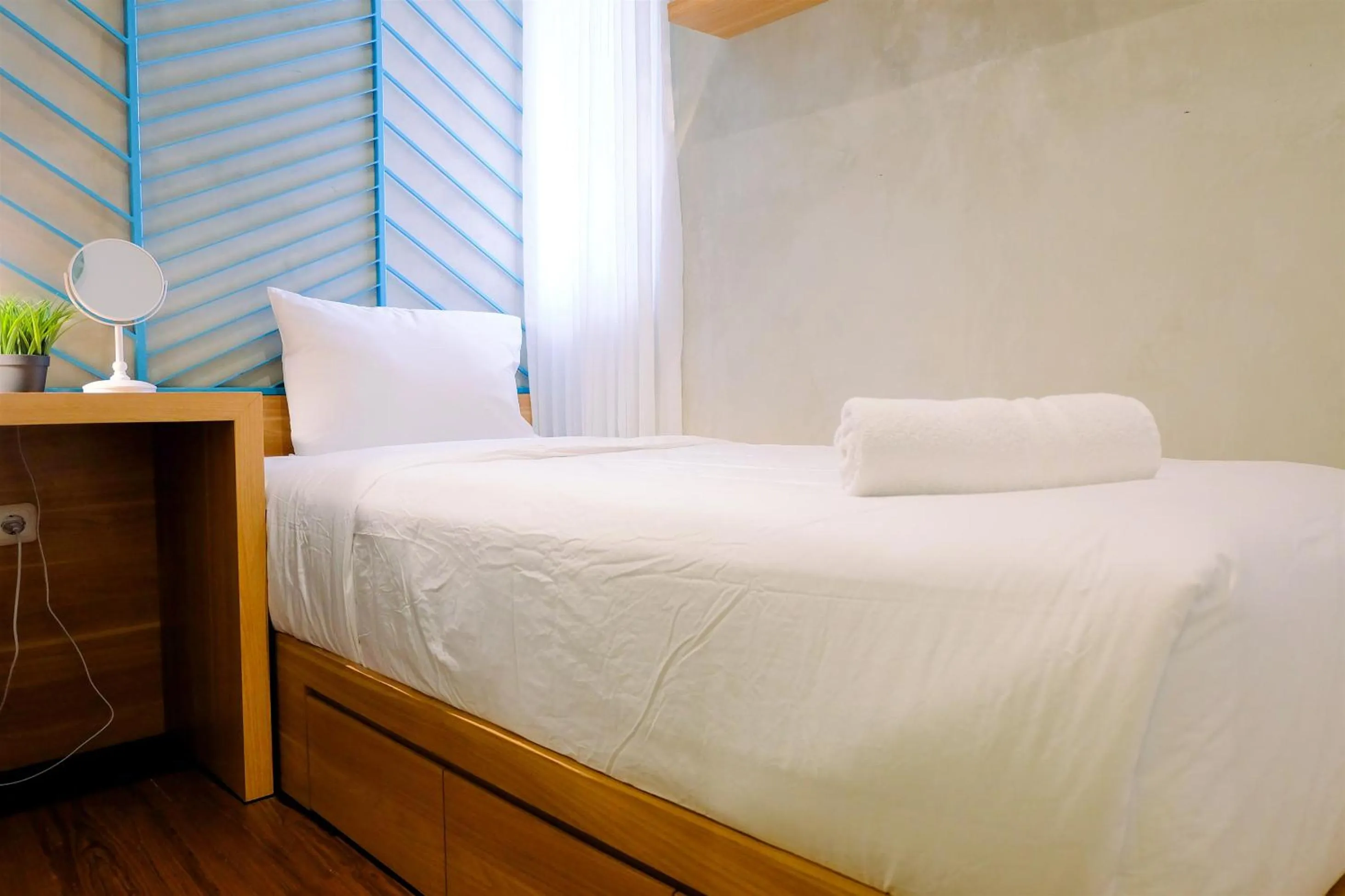 Bed in Modern and Stylish 2BR Pakubuwono Terrace Apartment By Travelio