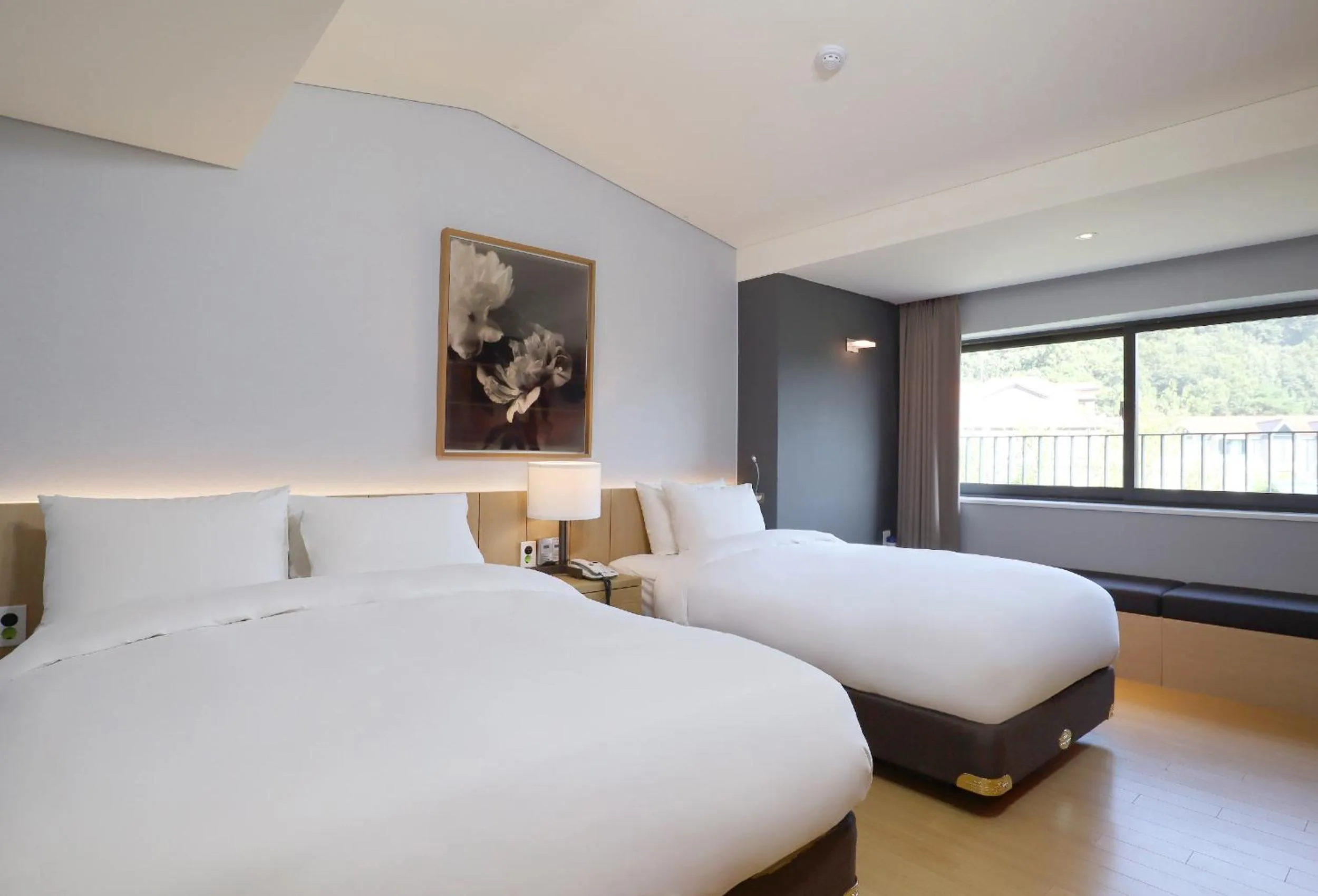 Bed in Eden Paradise Hotel