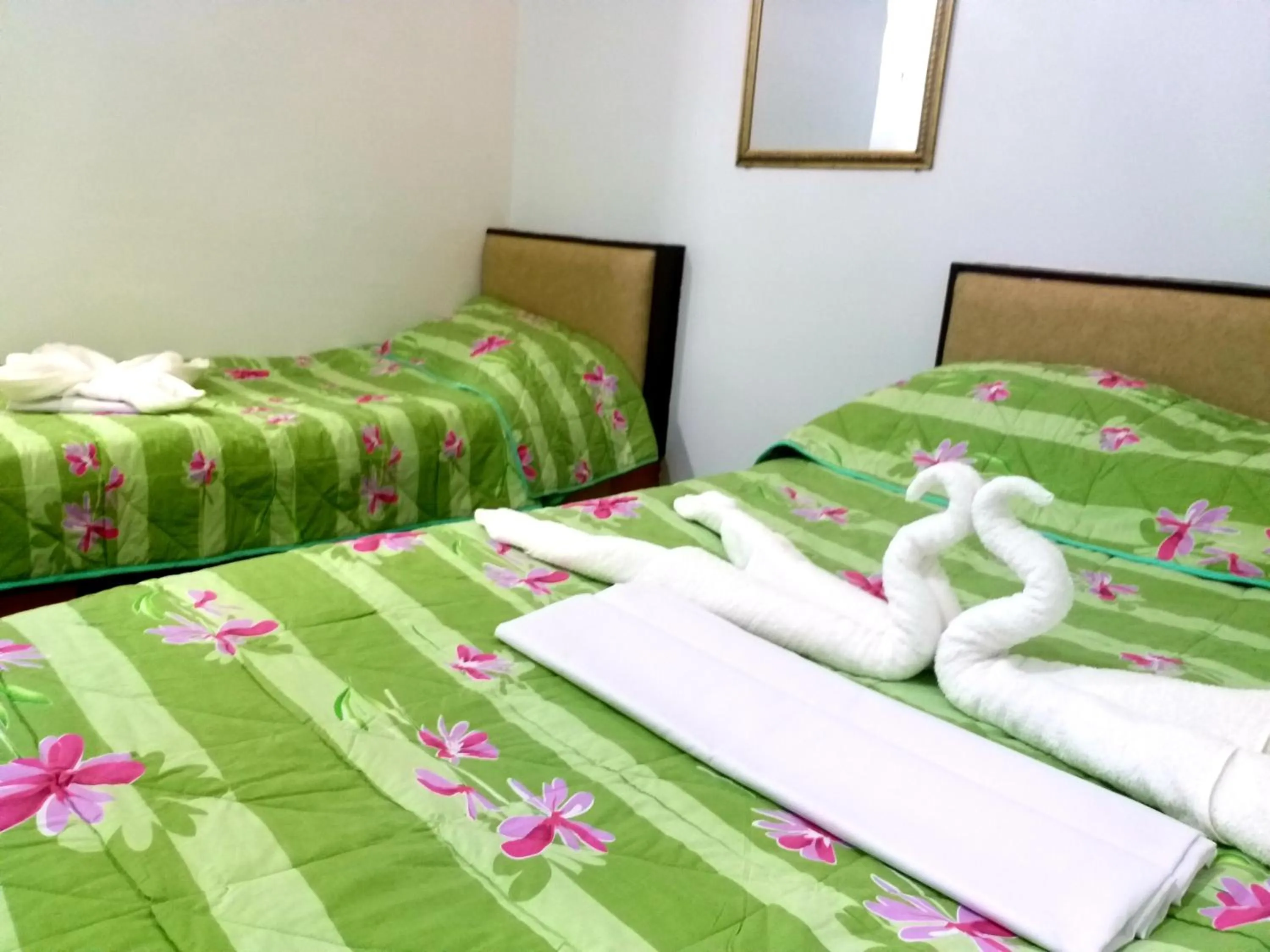 Bed in AMBIANZA APARTELLE
