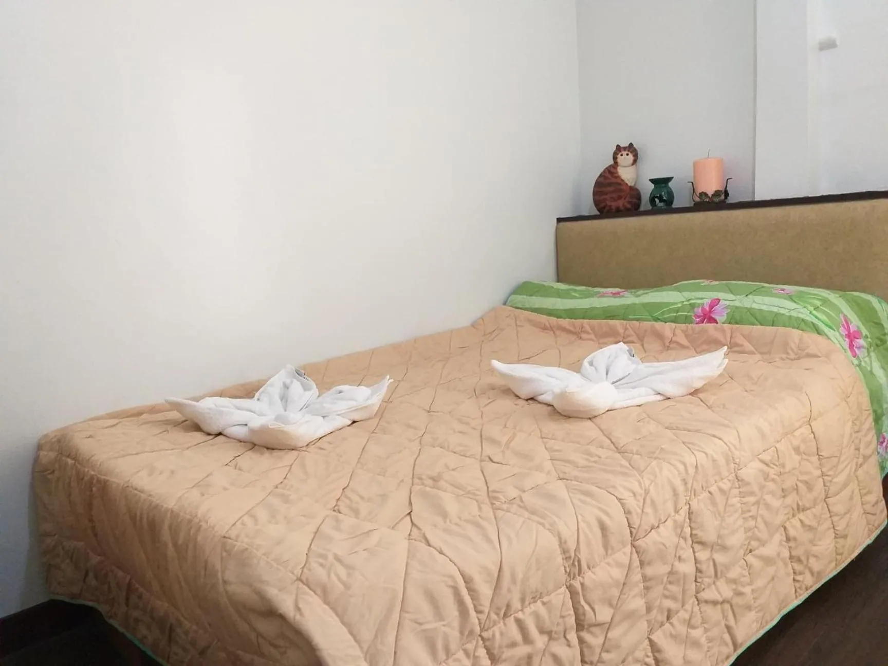 Bed in AMBIANZA APARTELLE