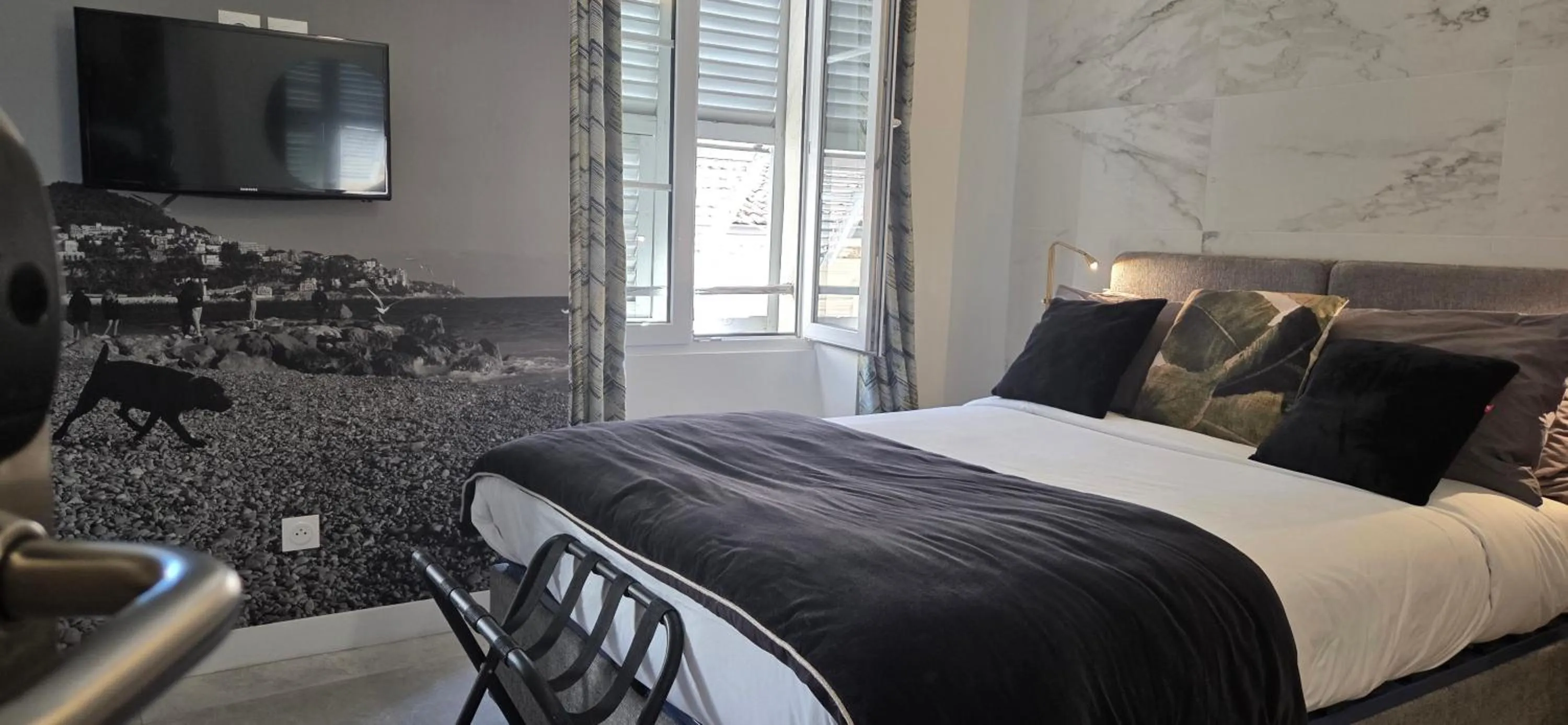 Bed in Le Petit Trianon et le Charme des Suites