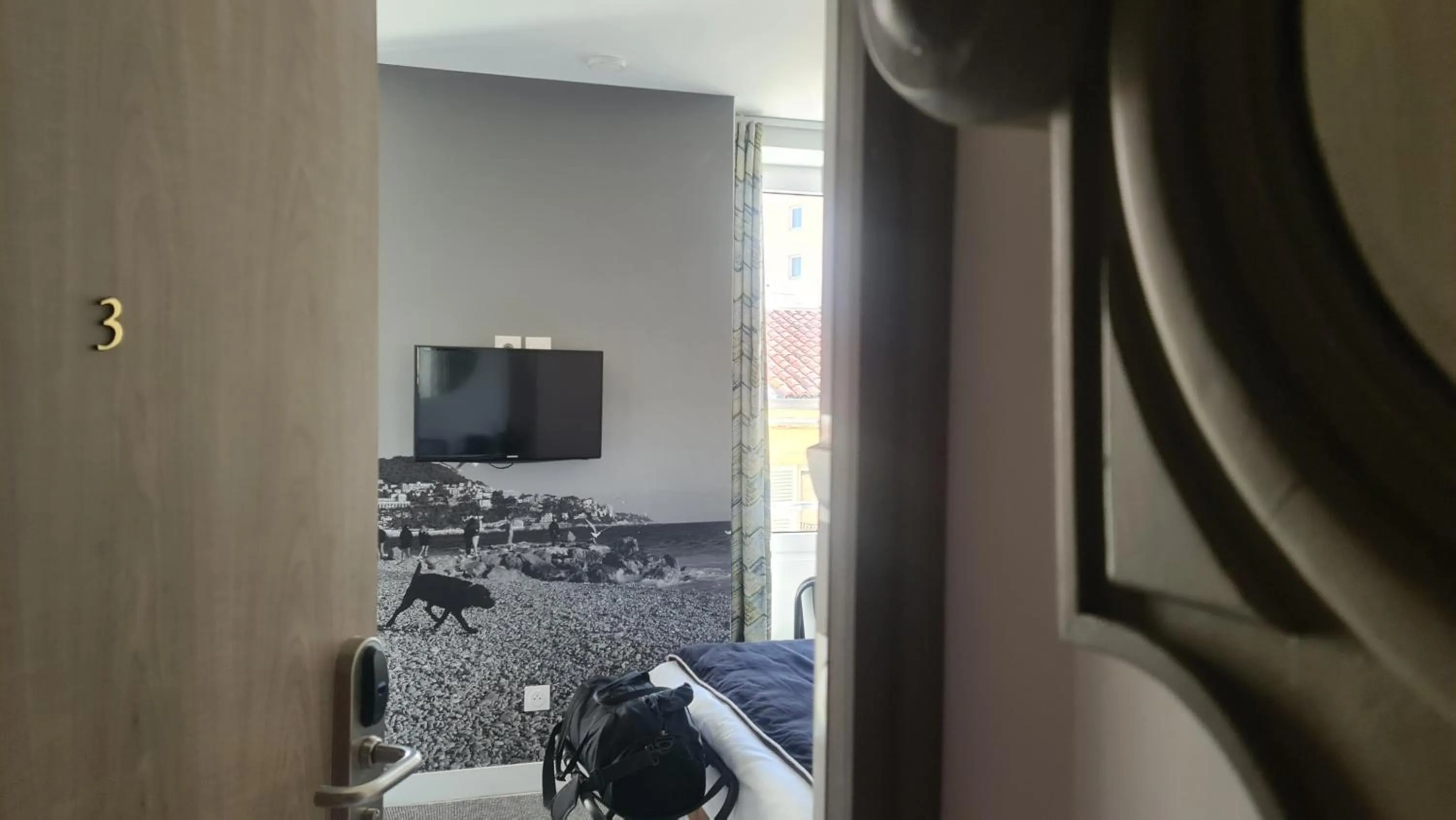 Facade/entrance in Le Petit Trianon et le Charme des Suites