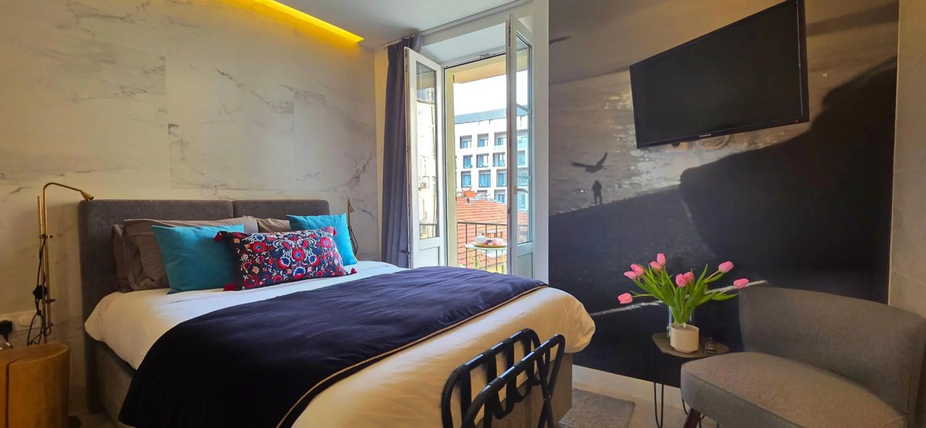 Bed in Le Petit Trianon et le Charme des Suites