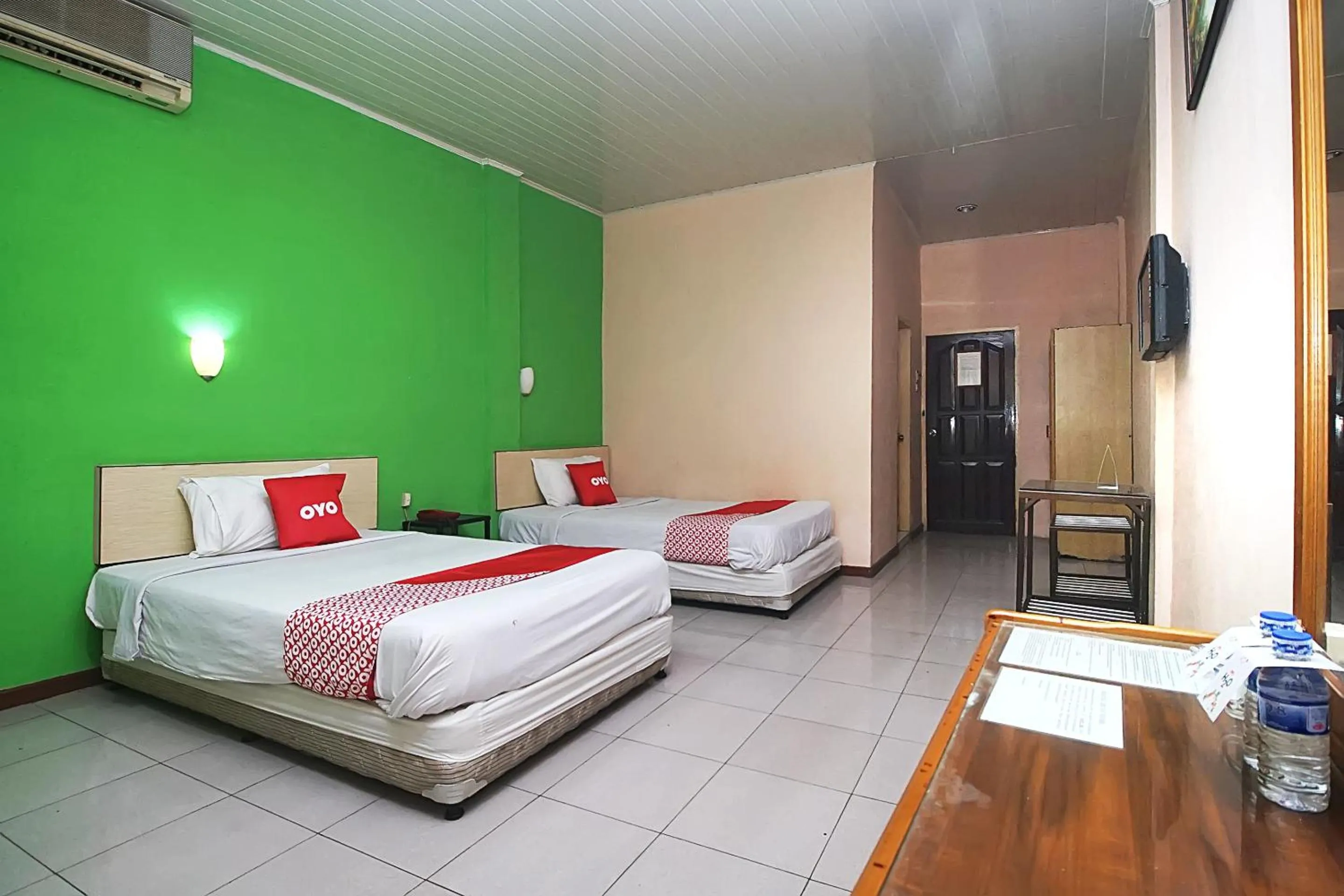 Bedroom in OYO 2079 Jambi Raya Hotel