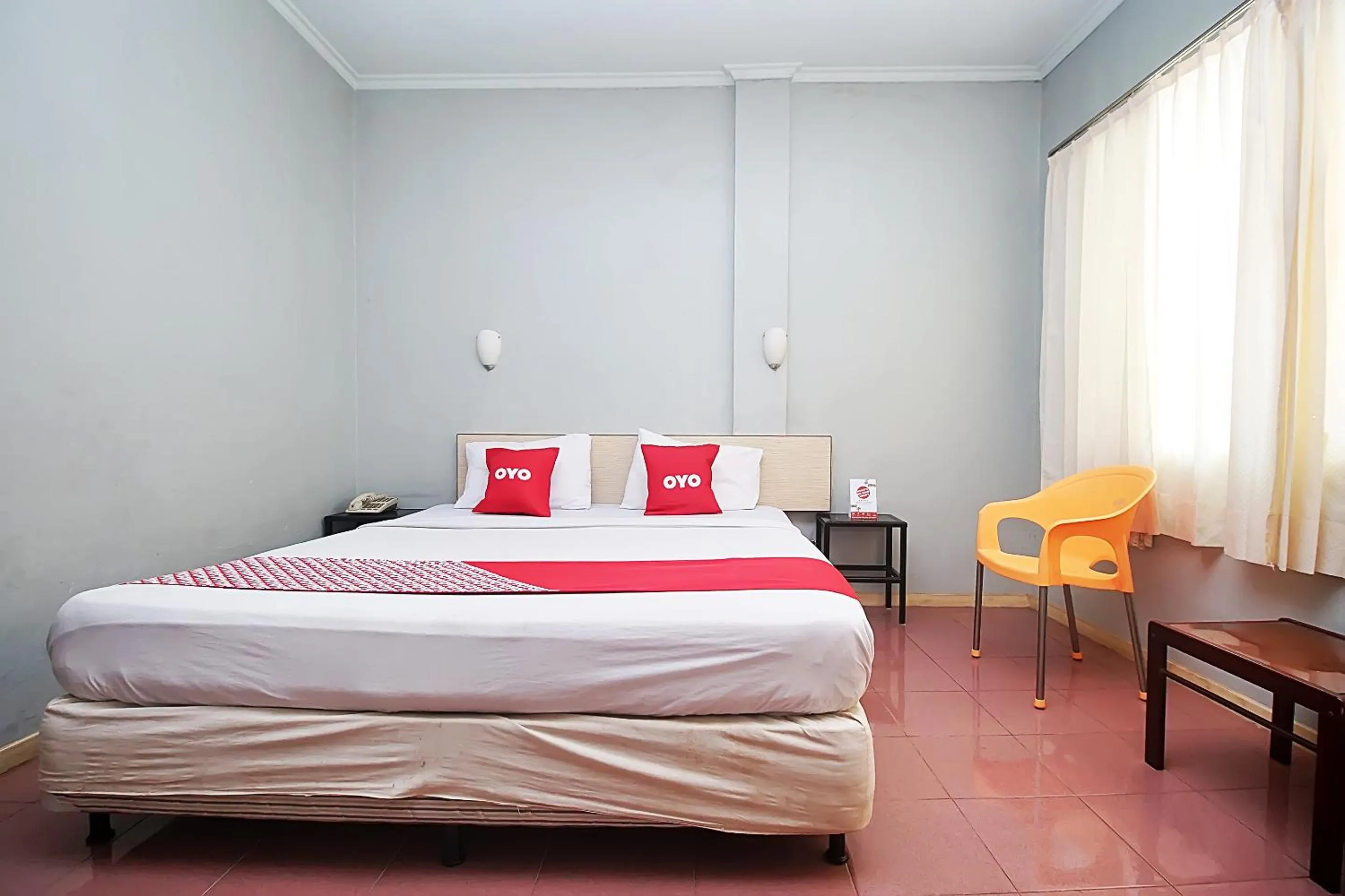 Bedroom in OYO 2079 Jambi Raya Hotel