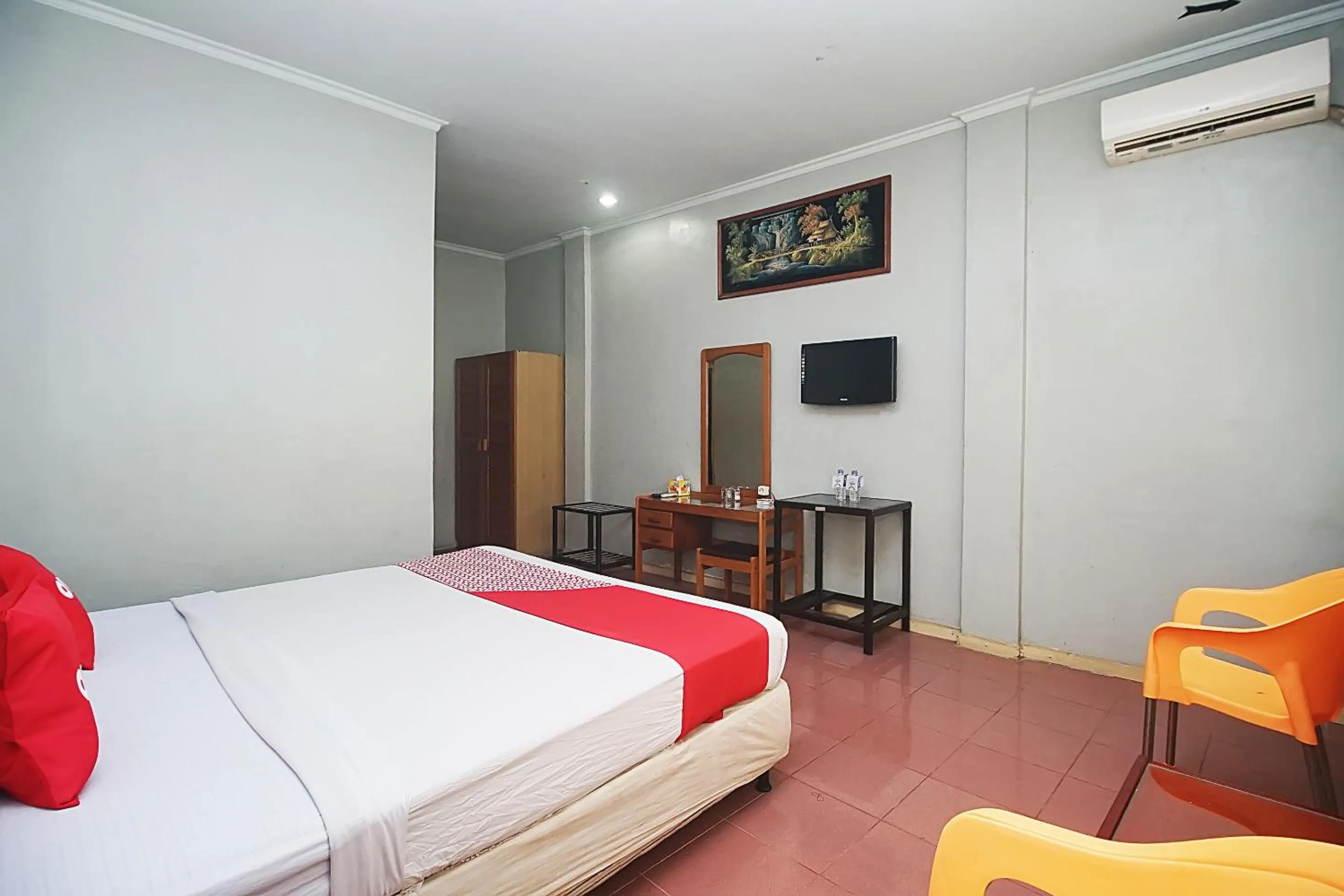 Bedroom in OYO 2079 Jambi Raya Hotel