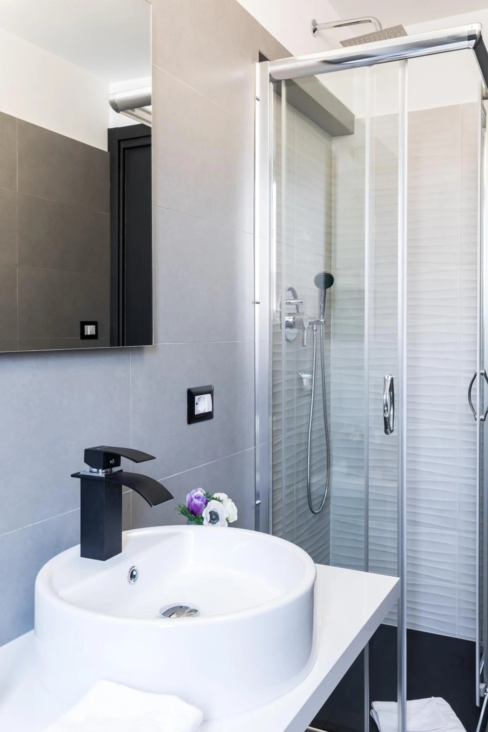 Shower in A World Aparts - 32 Modena