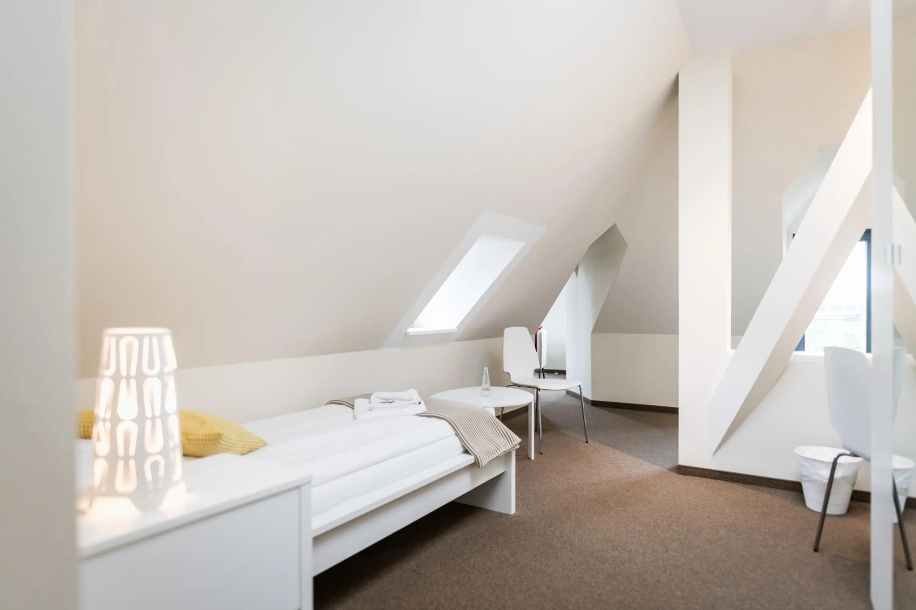 Photo of the whole room, Bed in Johanniterhaus Wittenberg