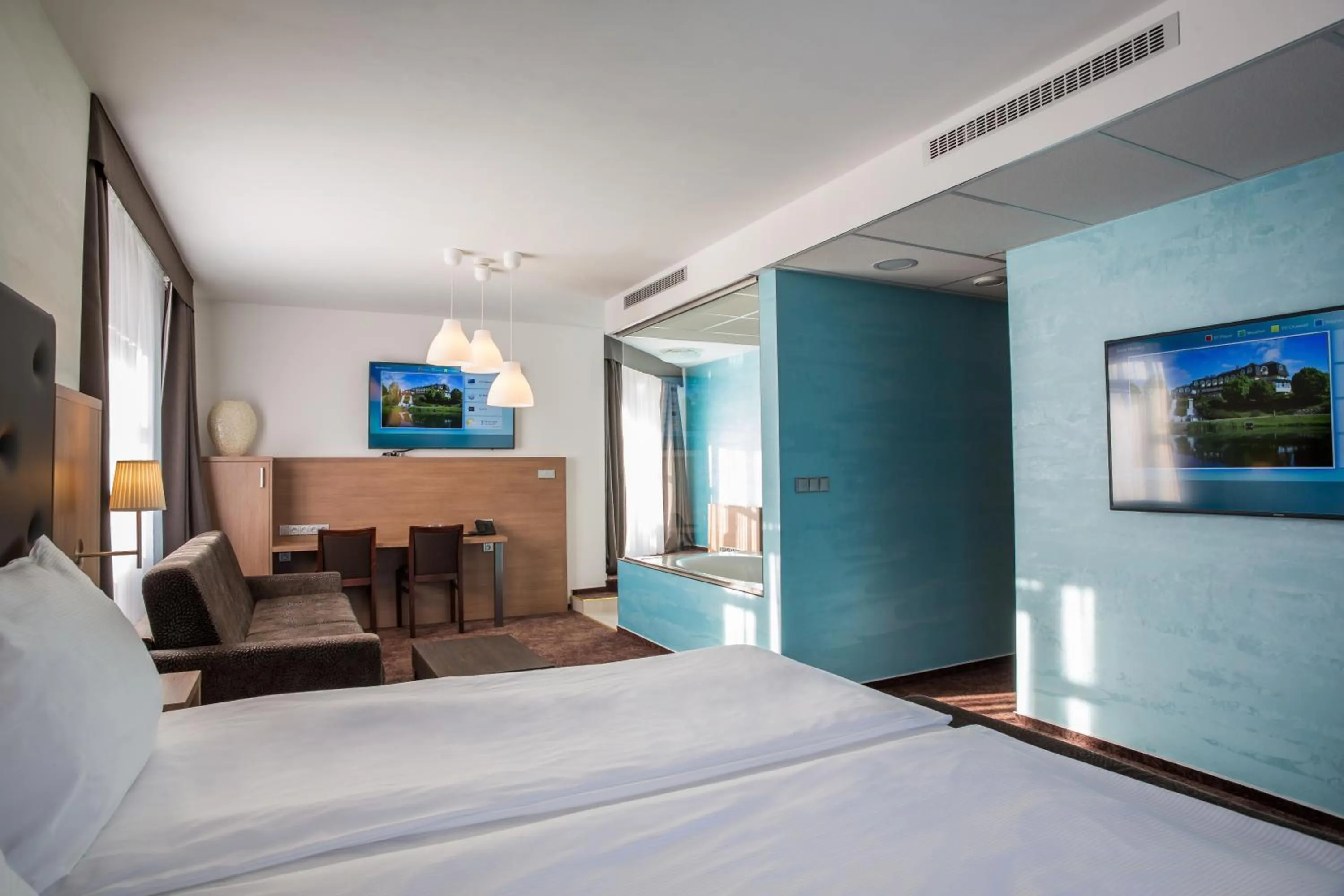 Communal lounge/ TV room, Bed in Hotel Galatea