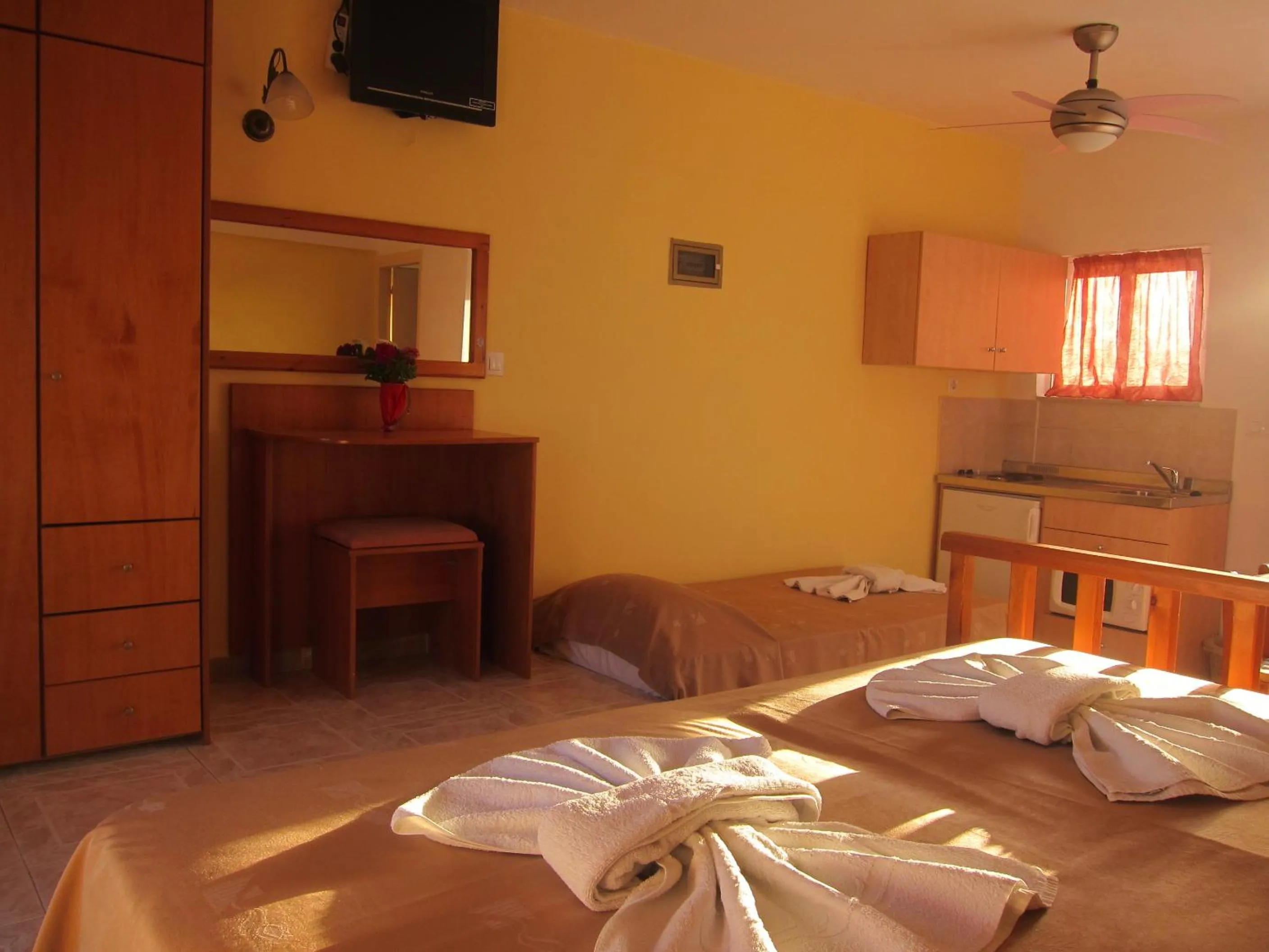 Kitchen or kitchenette, Bed in Baladinos Apartments