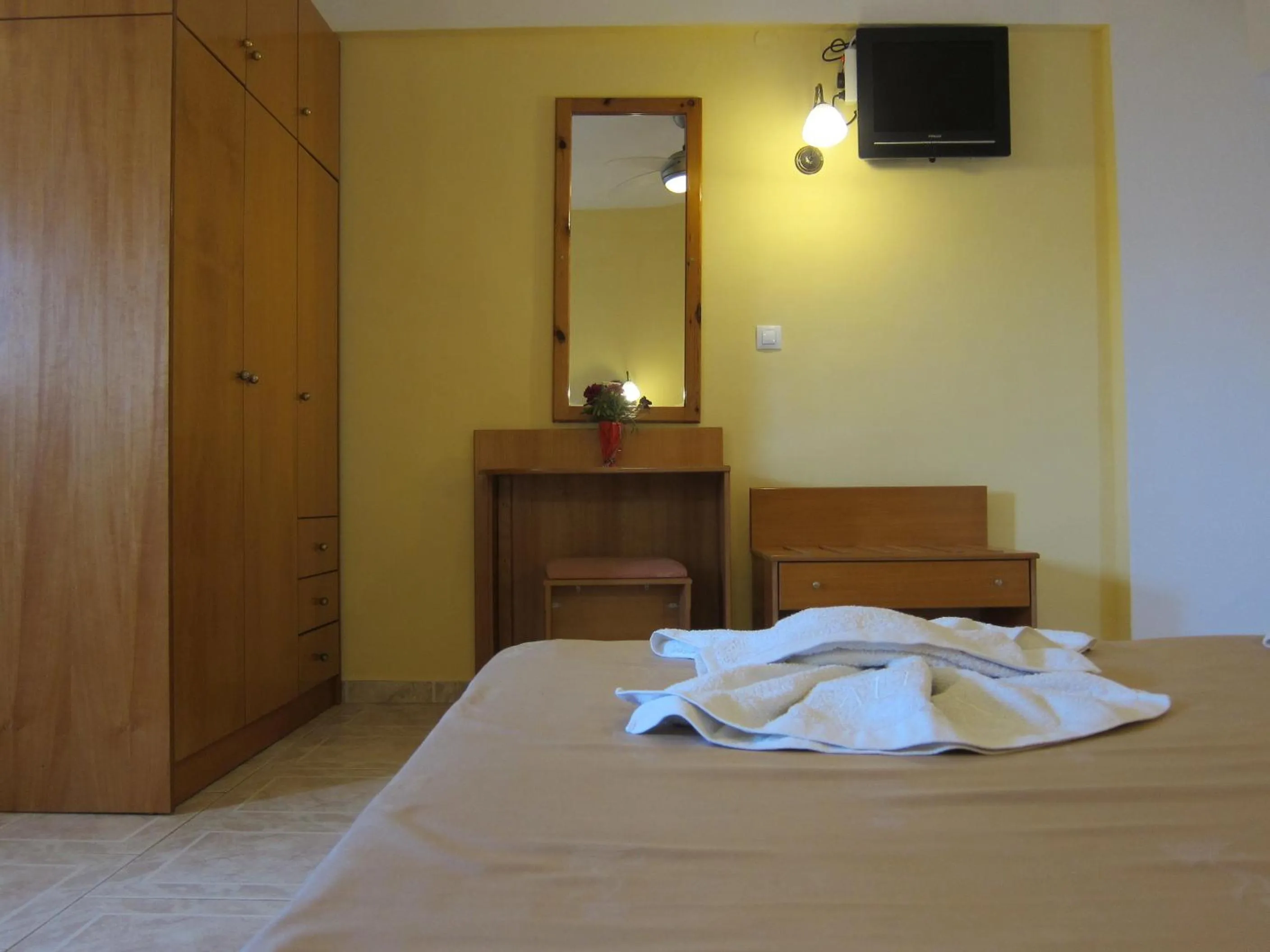 Decorative detail, Bed in Baladinos Apartments