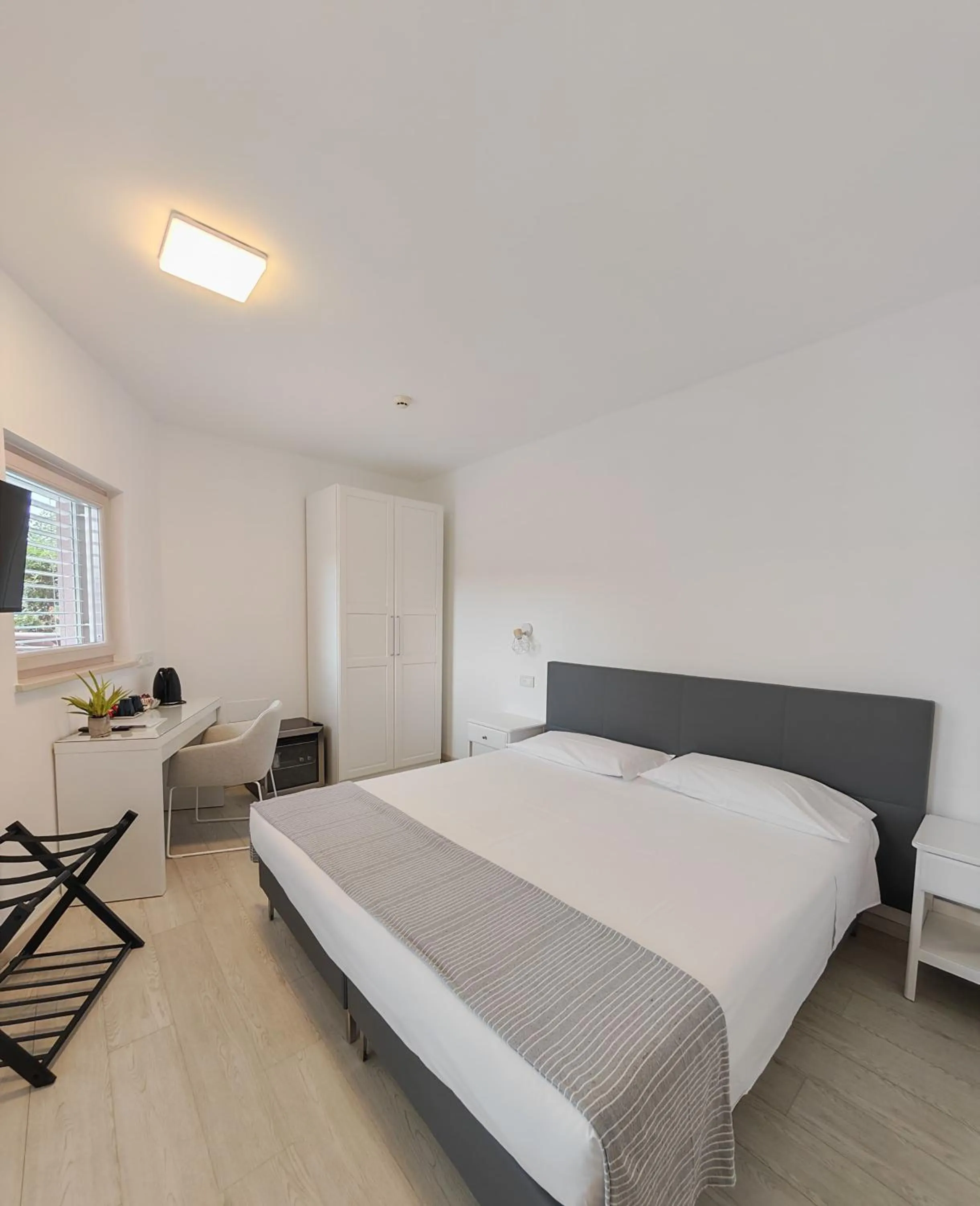 Bed in Nuova Opera Rooms & Apartment