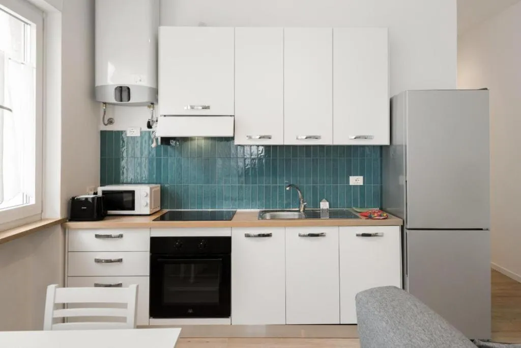 Kitchen or kitchenette in Nuova Opera Rooms & Apartments