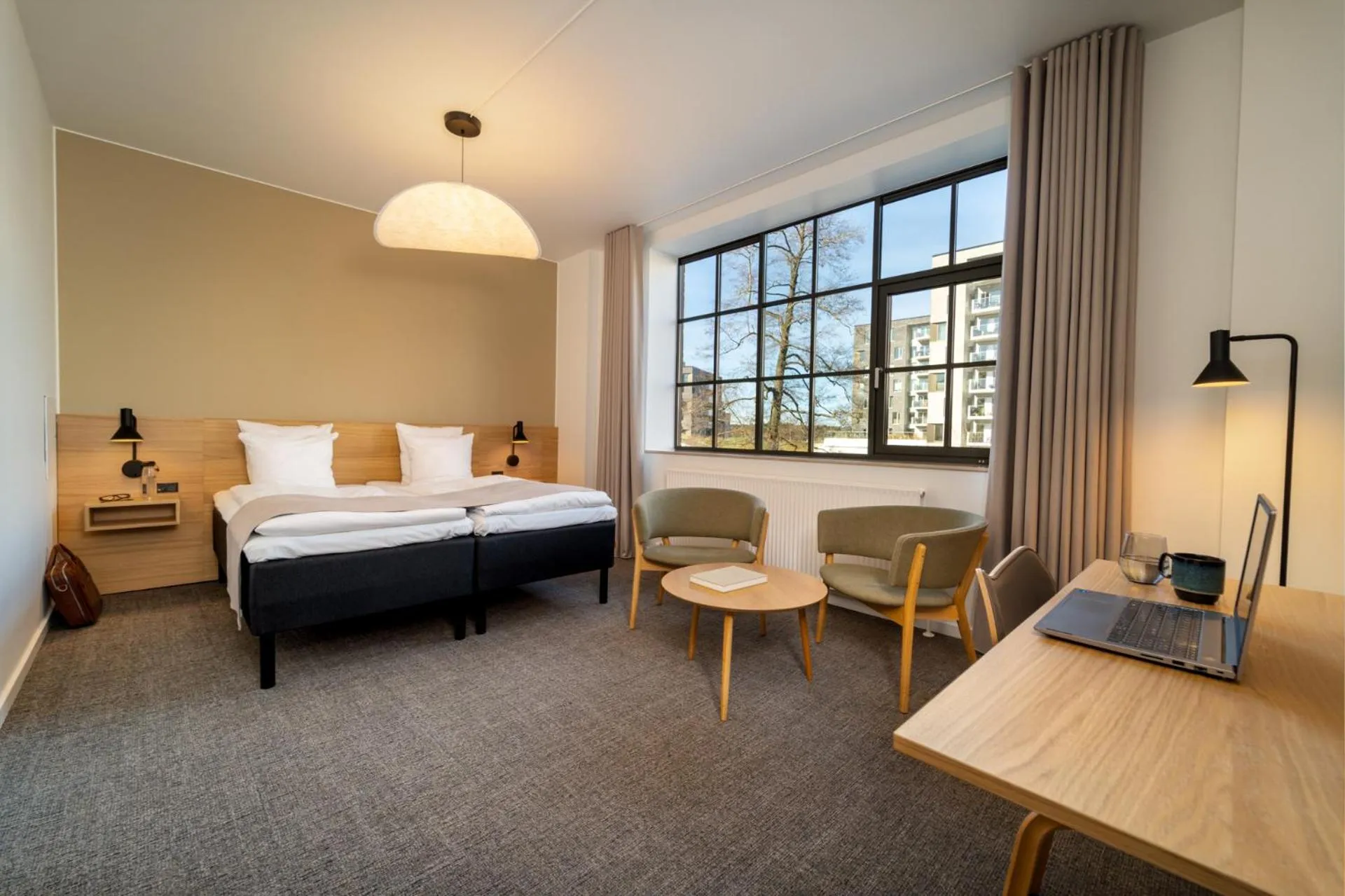 Seating area, Bed in Radisson Hotel Papirfabrikken Silkeborg