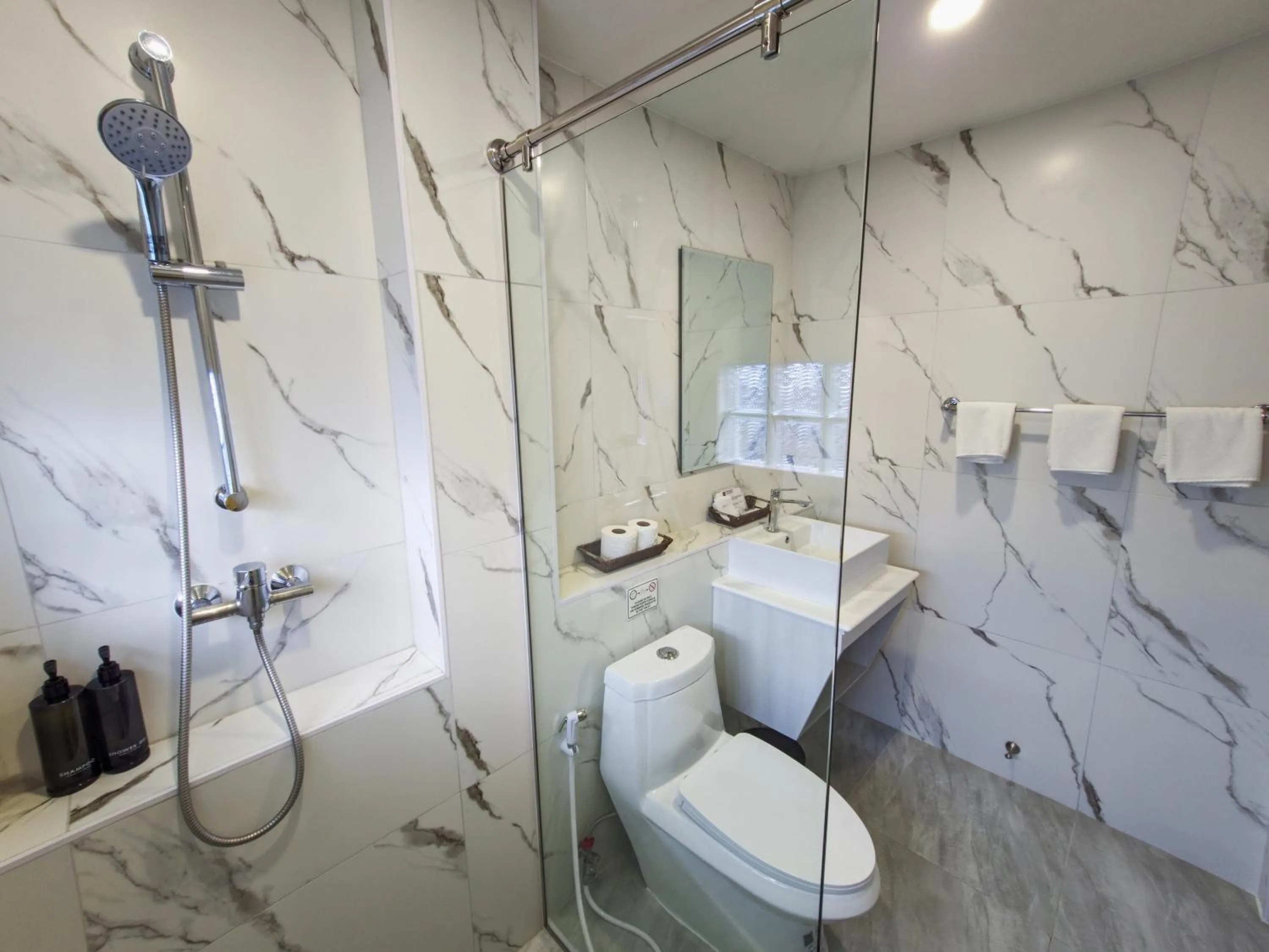 Bathroom in Phuket Airport Hotel - SHA Extra Plus