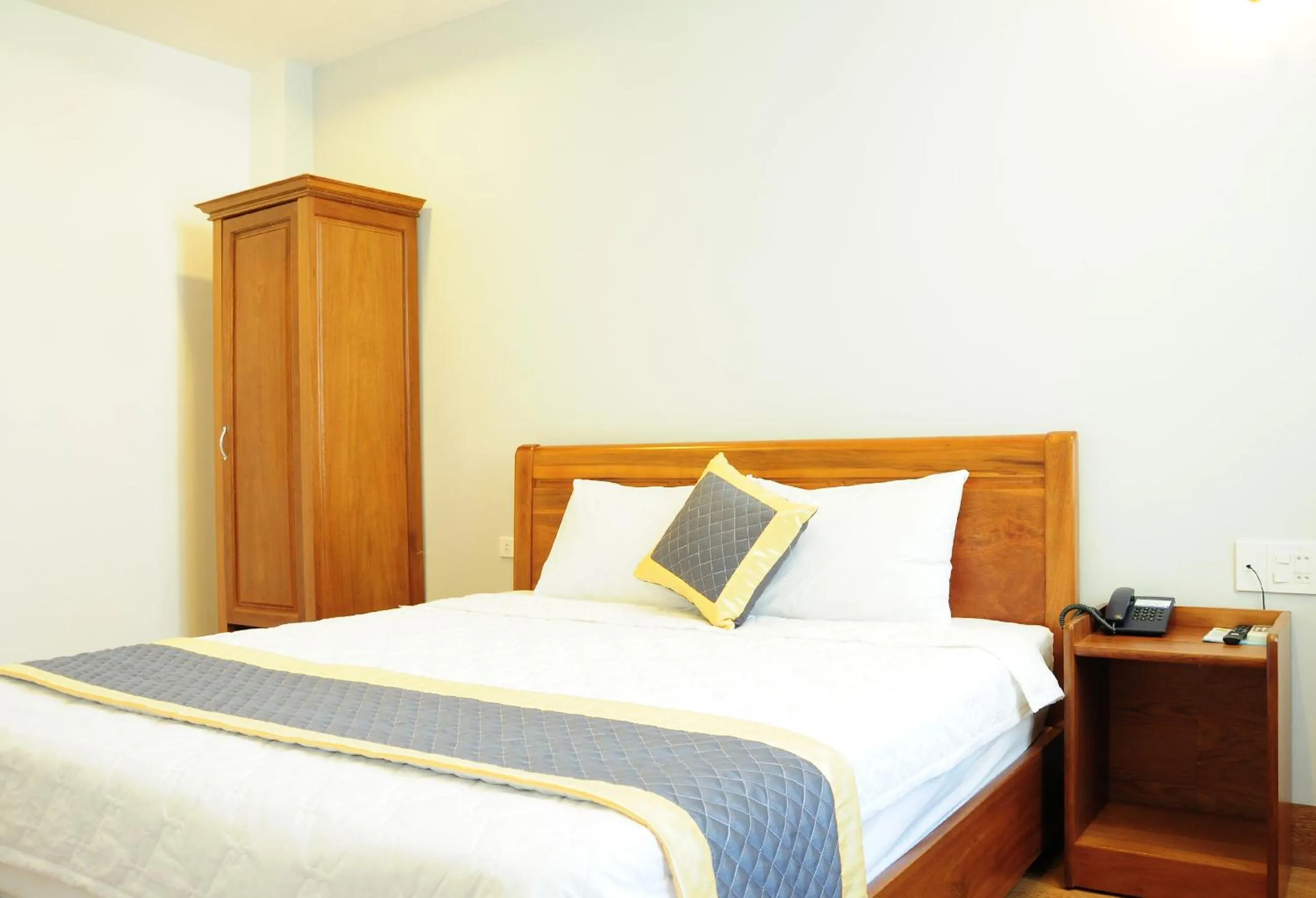 Bed in SEASIDE HOTEL