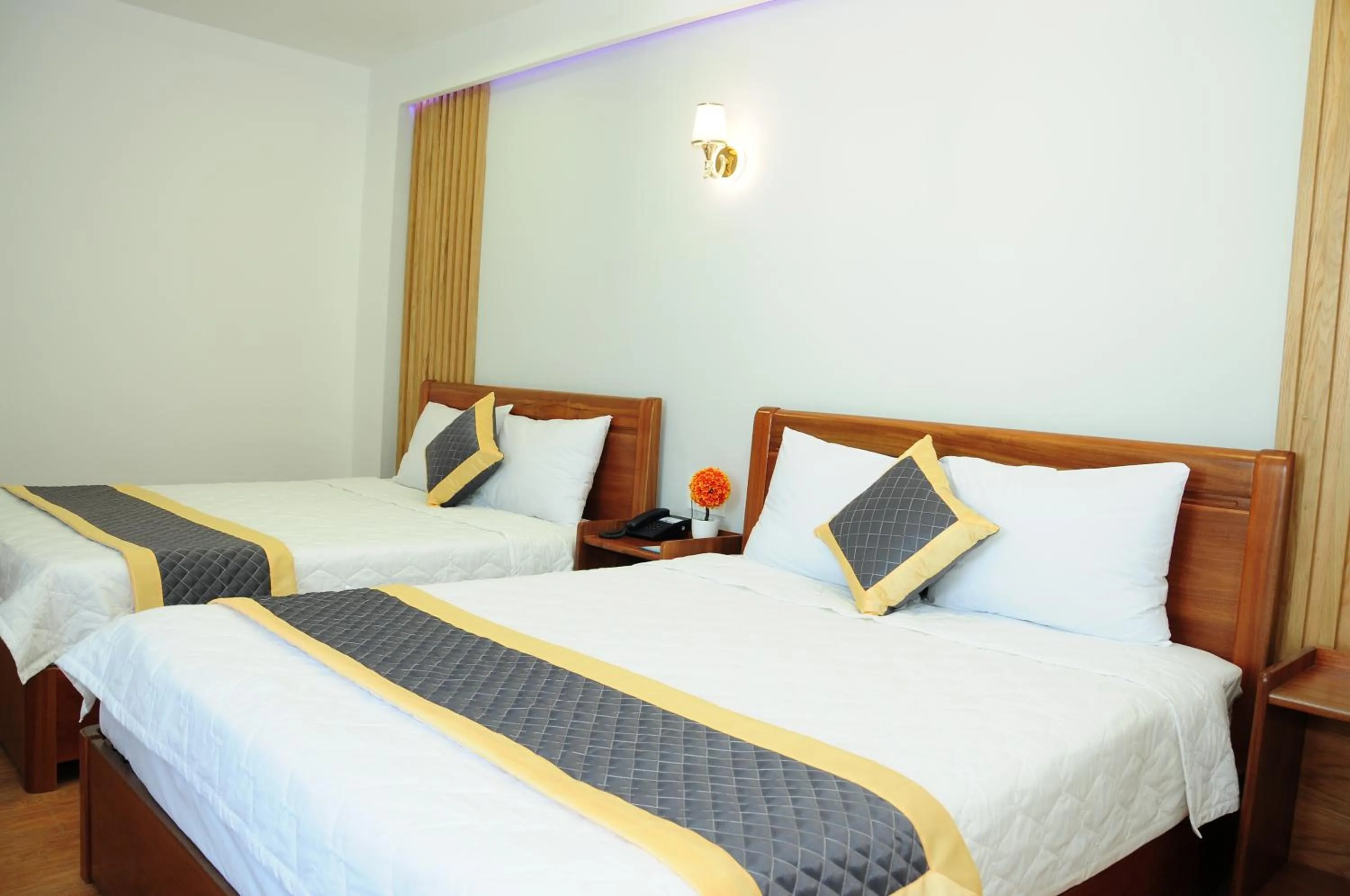 Bed in SEASIDE HOTEL