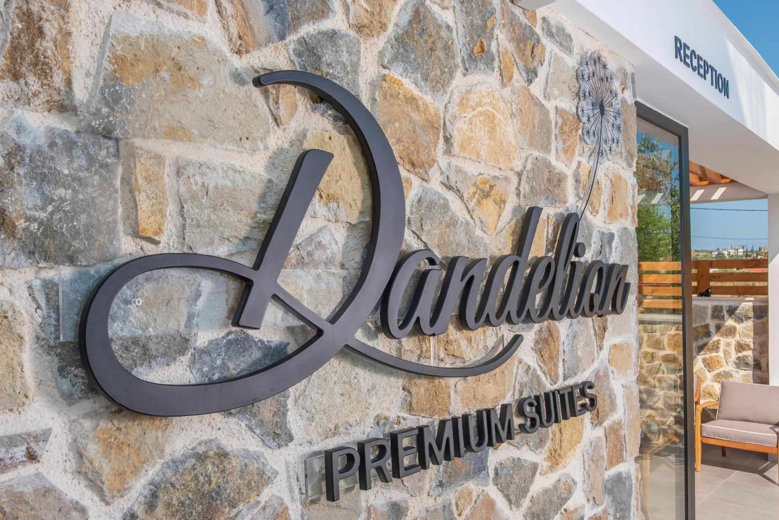 Property logo or sign in Dandelion Suites