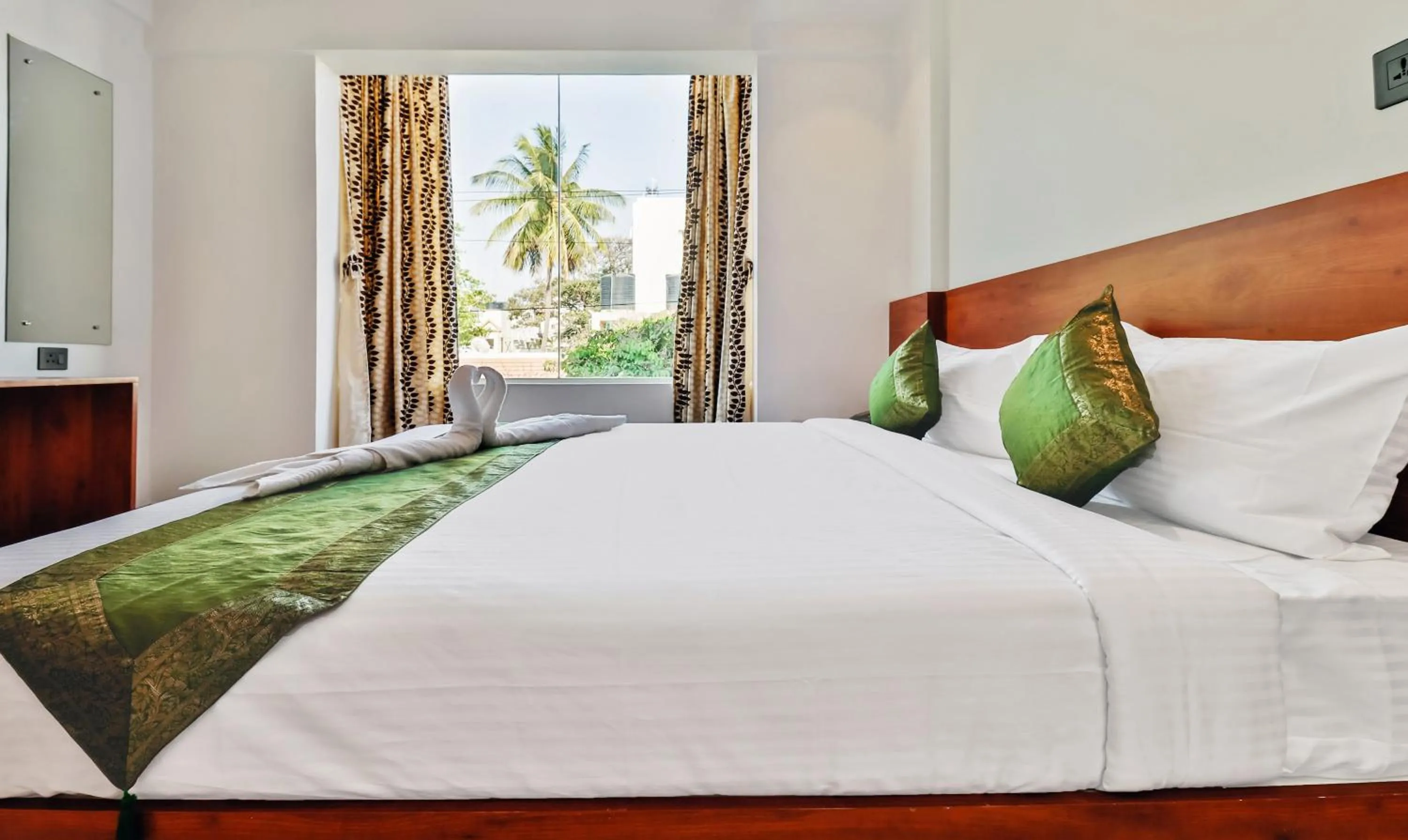 Bedroom, Bed in Treebo Blu Orchid