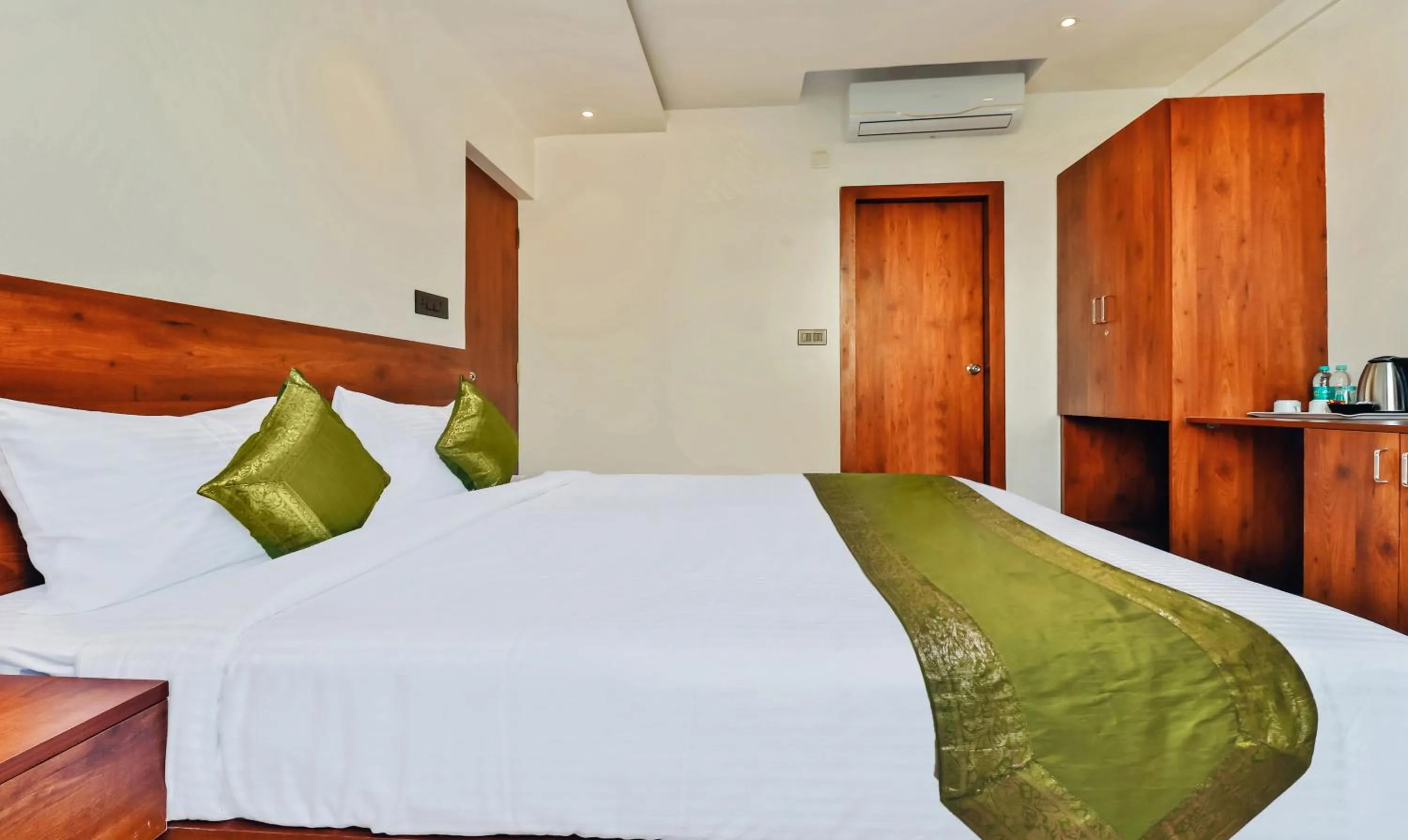 Bedroom, Bed in Treebo Blu Orchid