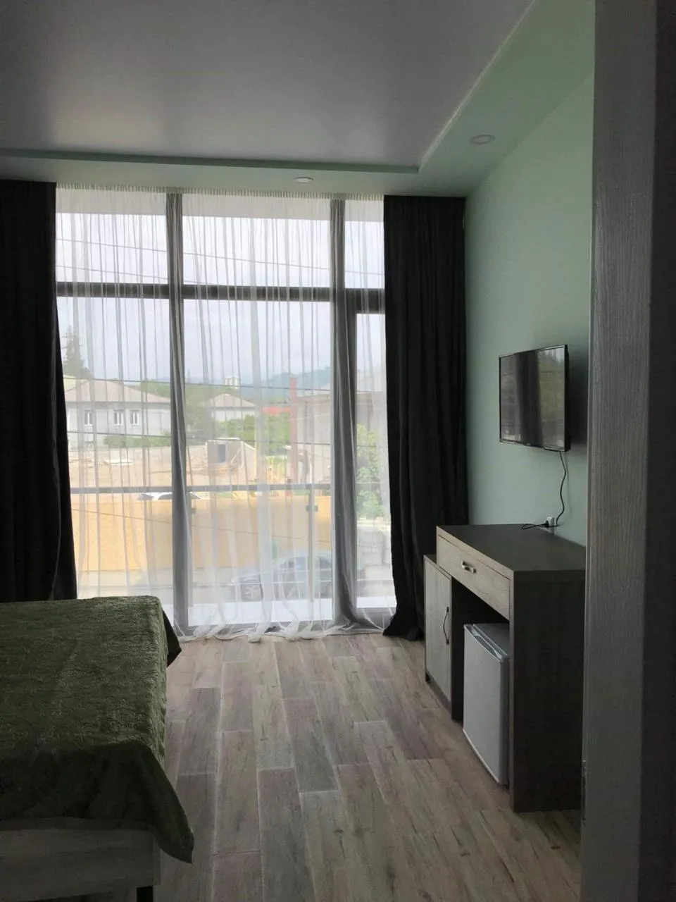 Communal lounge/ TV room, Bed in Hotel Royal Georgia