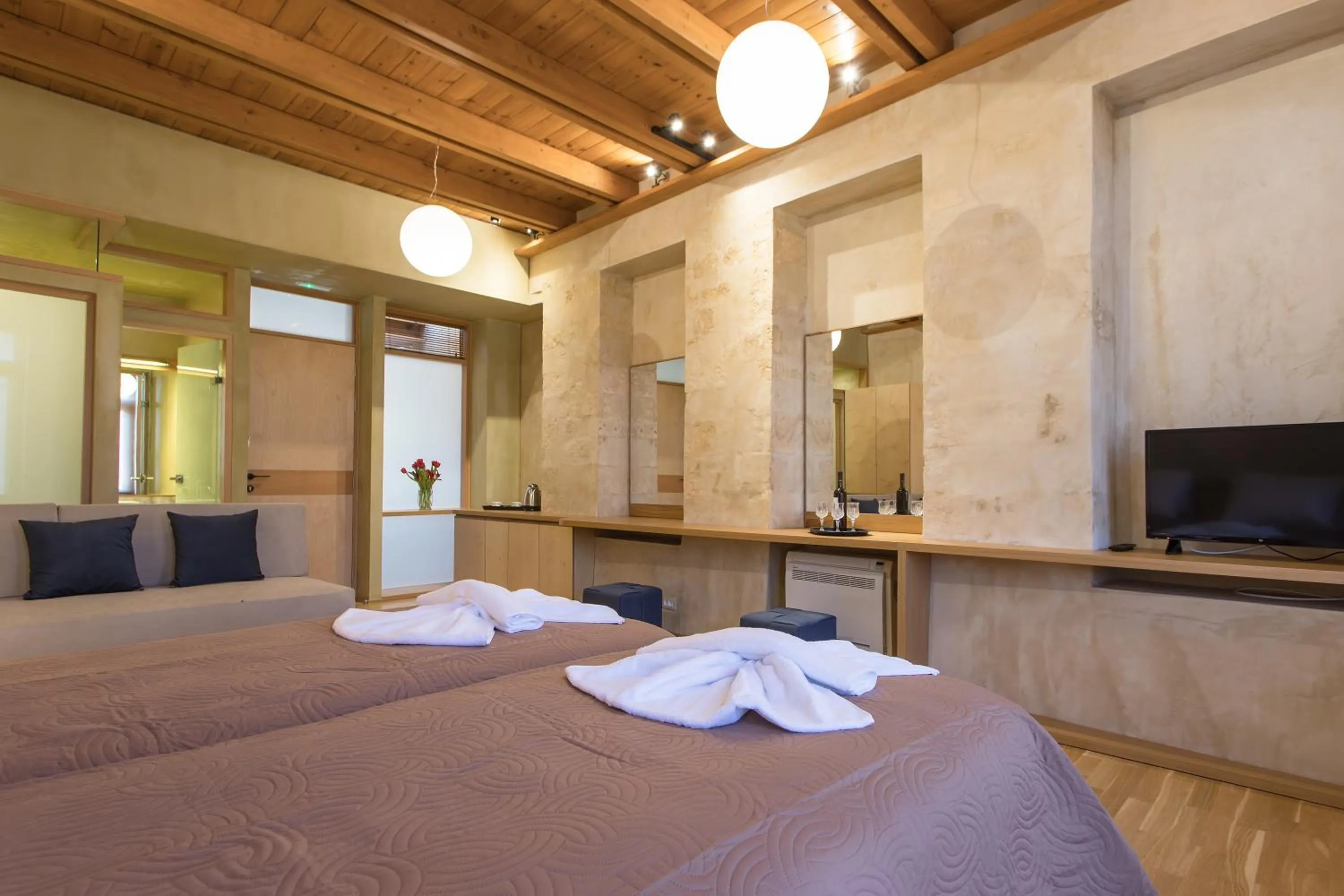 Bed in Polixeny's Suites