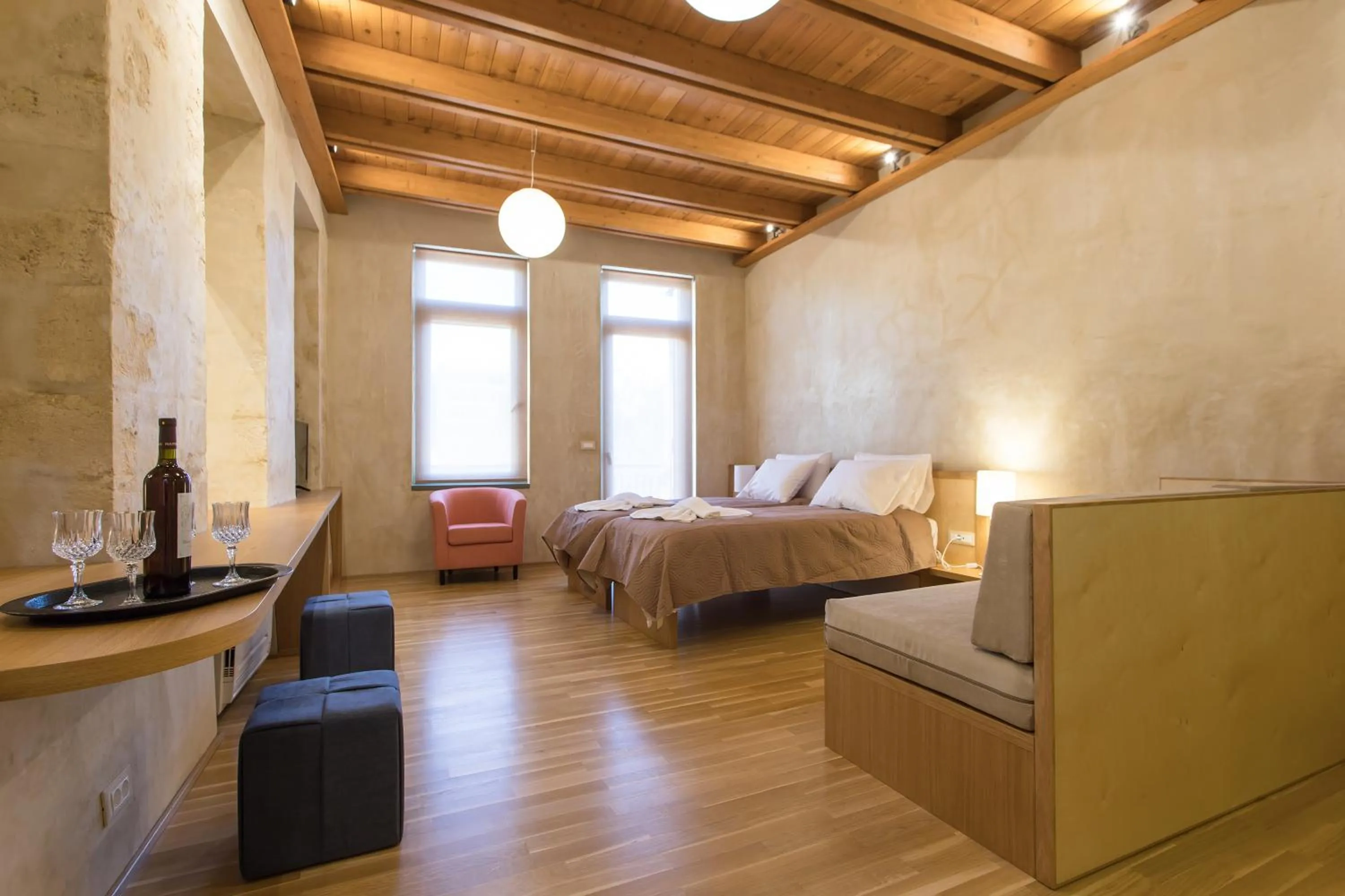 Bed in Polixeny's Suites