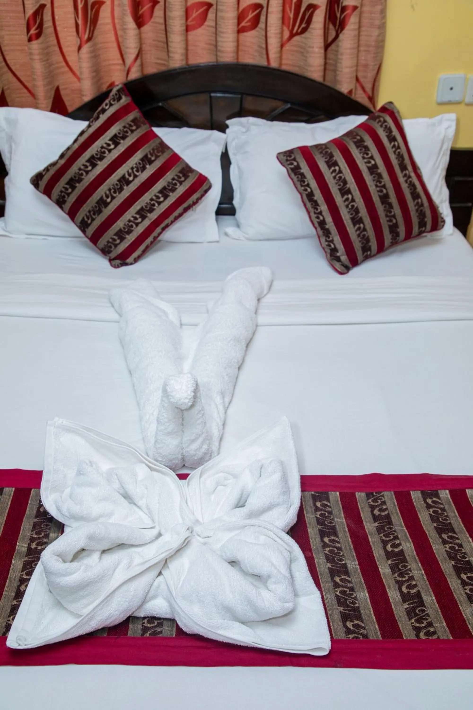 Bed in Hotel Bougainvillea