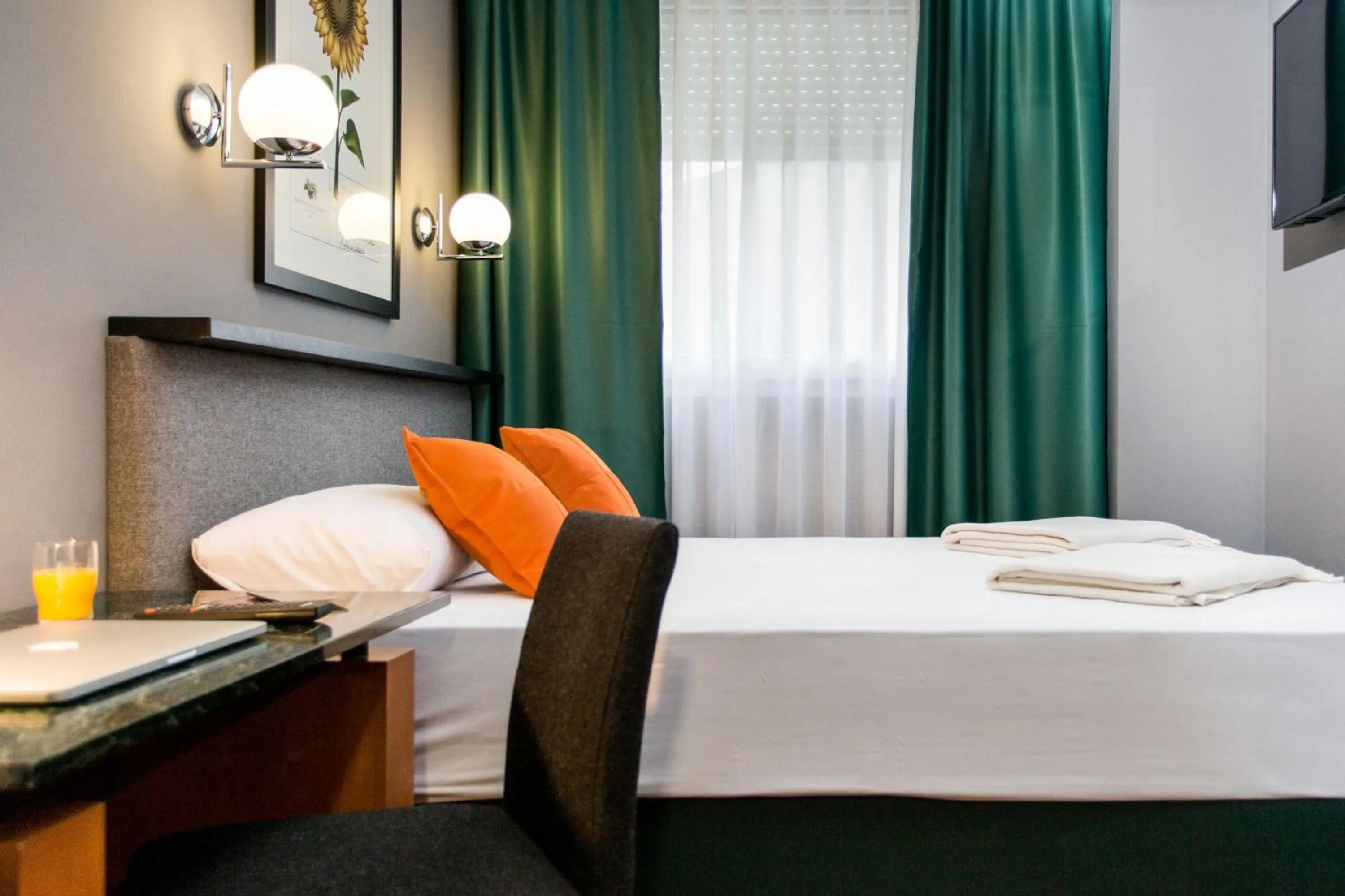 Bed in Hotel Malcom and Barret