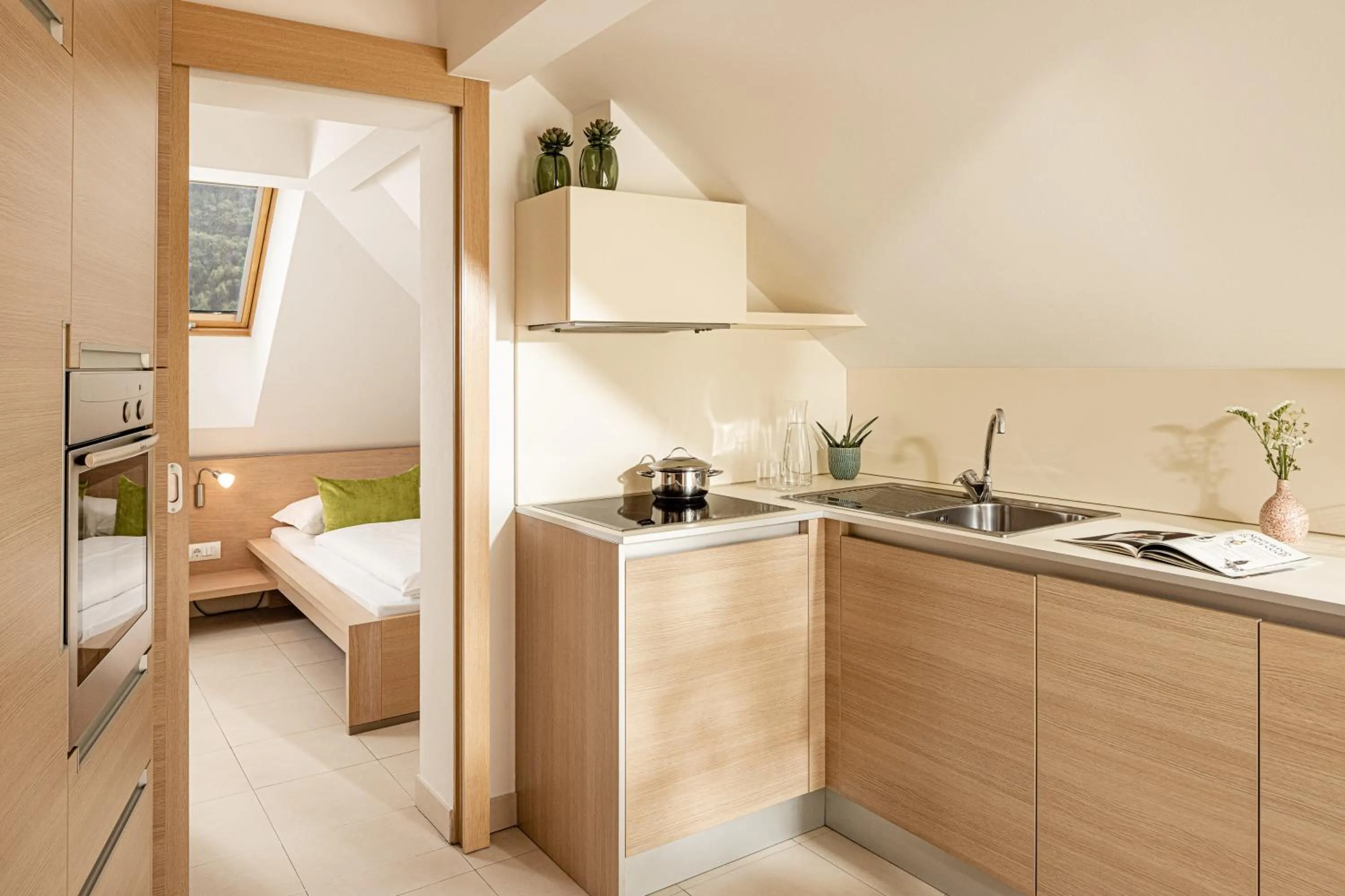 Kitchen or kitchenette, Bed in Garden Residence