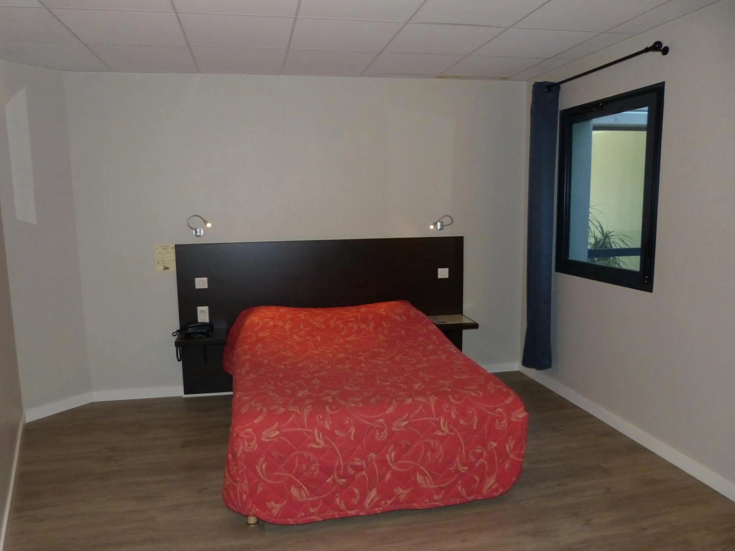 Bed in Hôtel Terminus