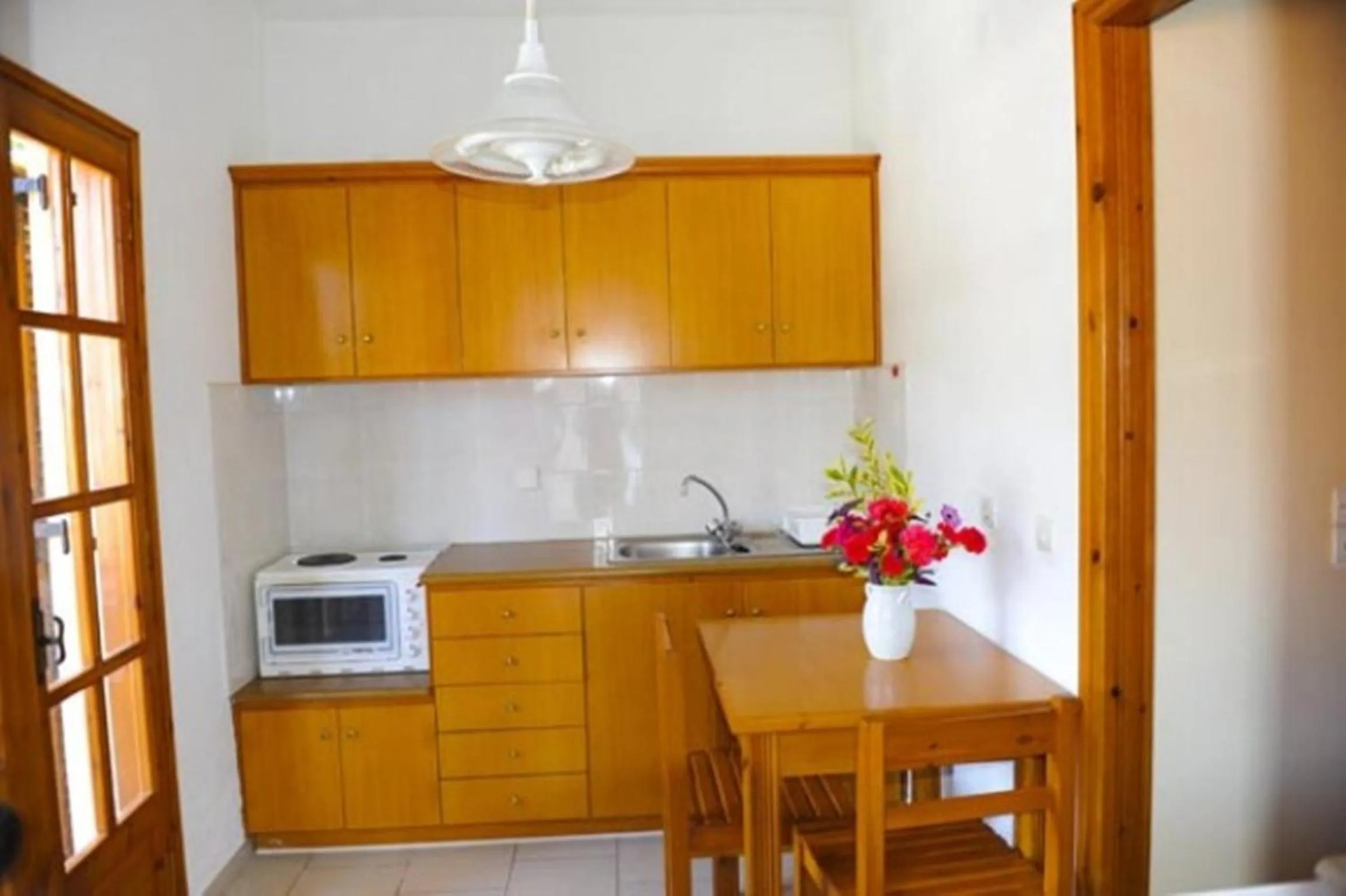 Kitchen or kitchenette in Irene Apartments