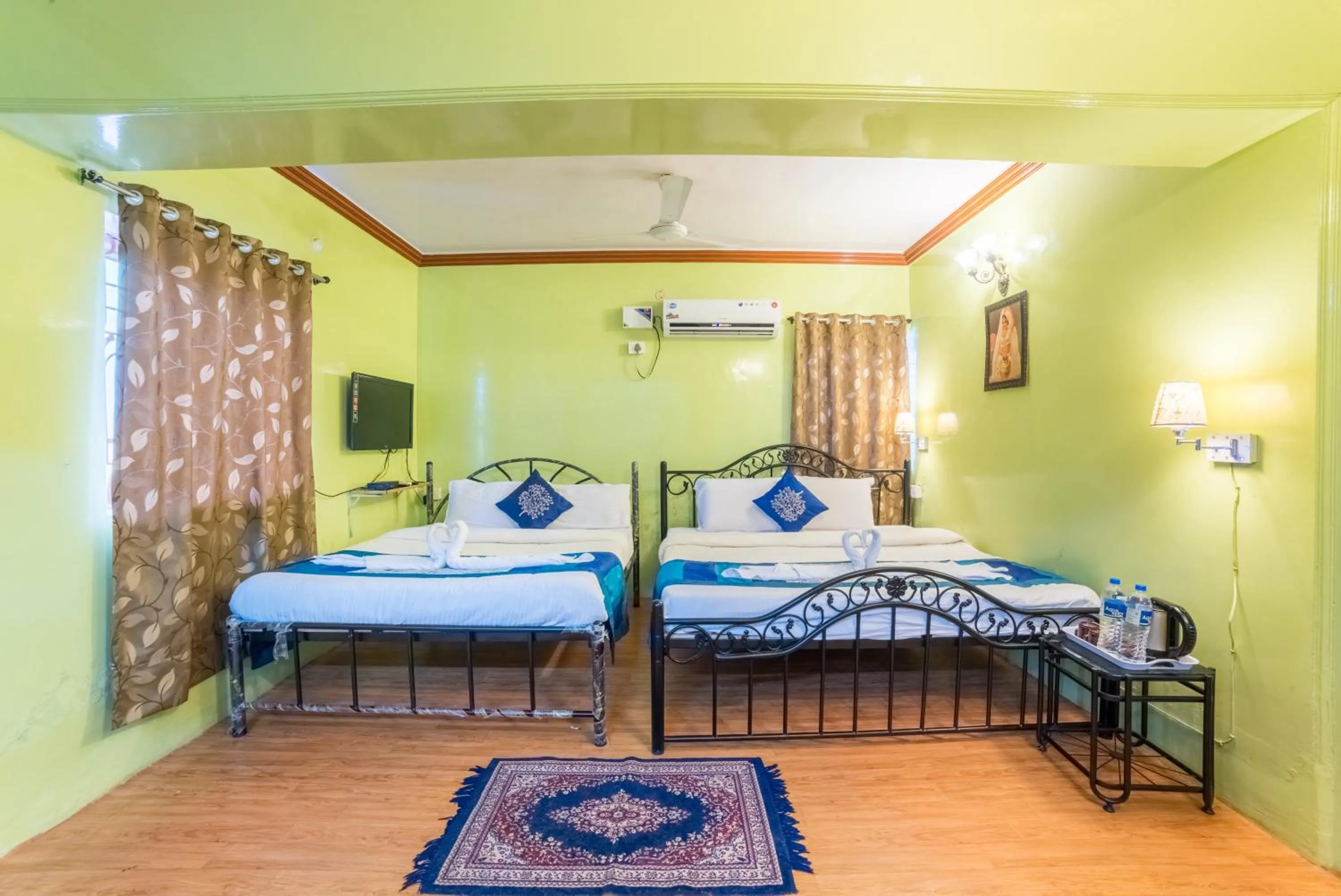 Bed in Kiara Hotel Goa