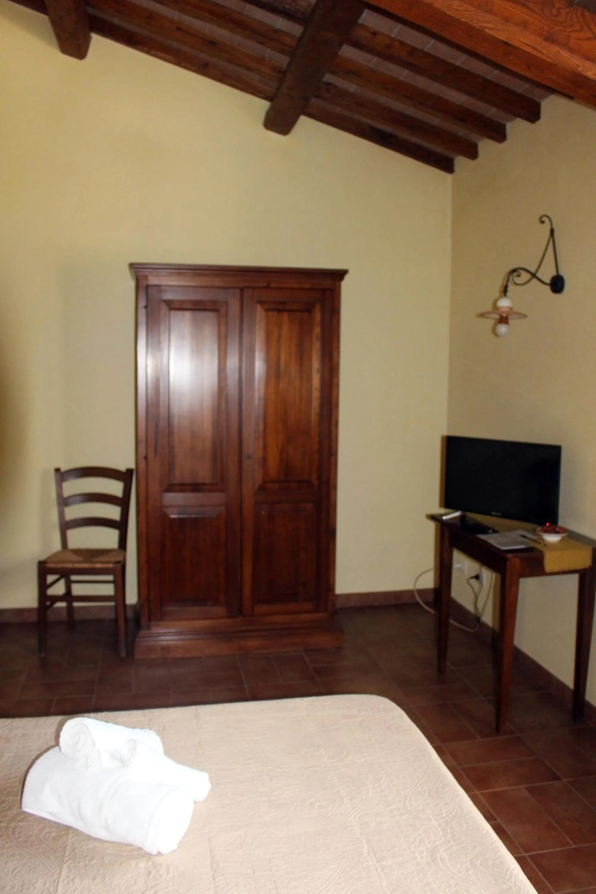 Bed, TV/Entertainment Center in Il Podere San Giuseppe