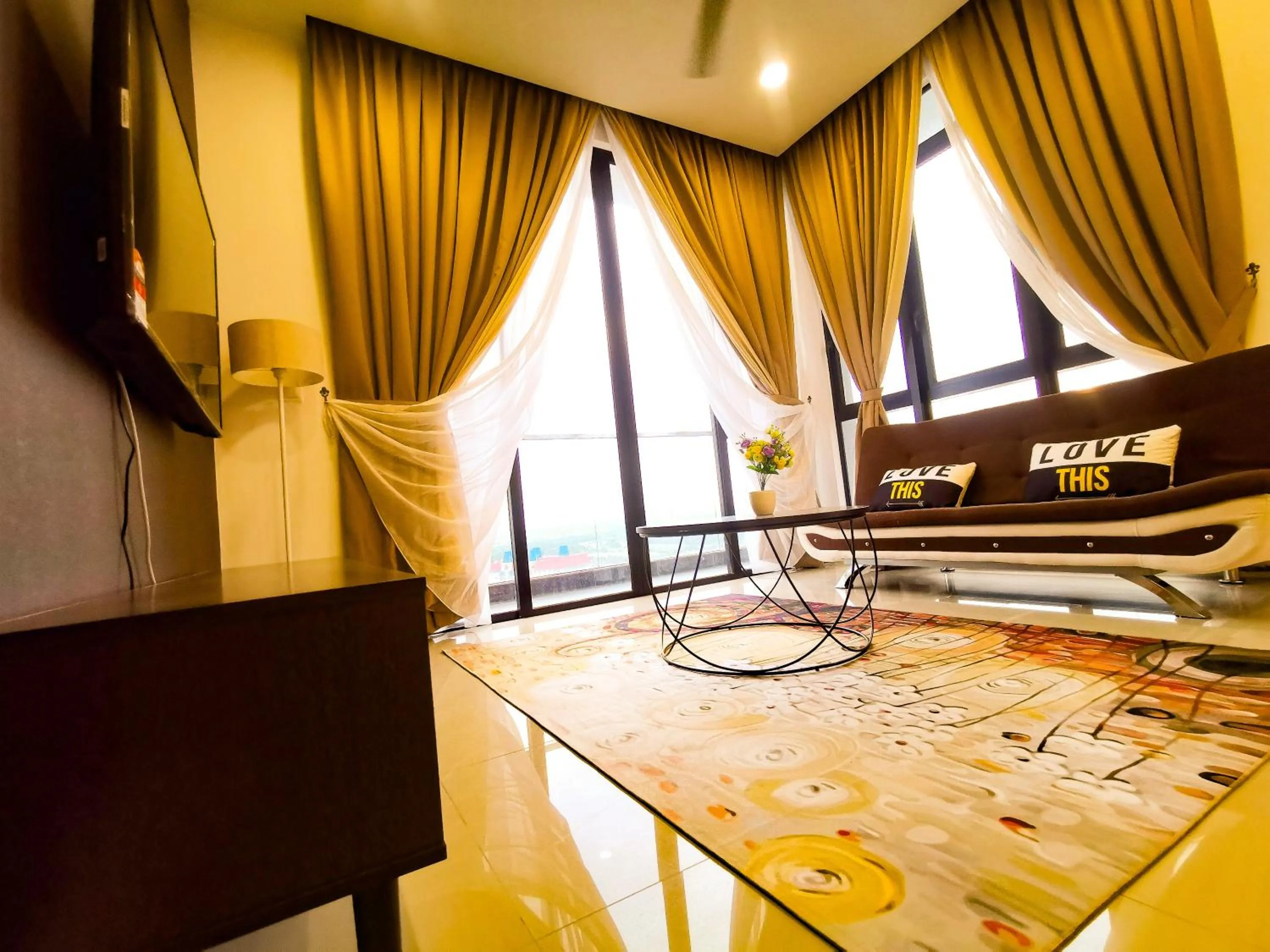 Communal lounge/ TV room in Legoland D'PRISTINE Apartment By TGP