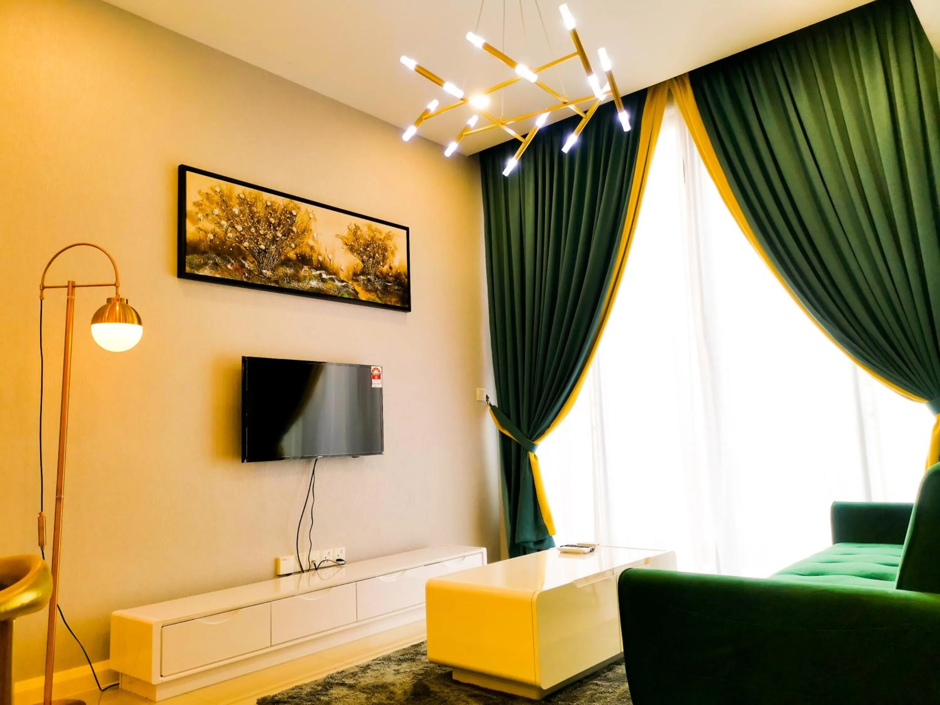 Communal lounge/ TV room in Legoland D'PRISTINE Apartment By TGP