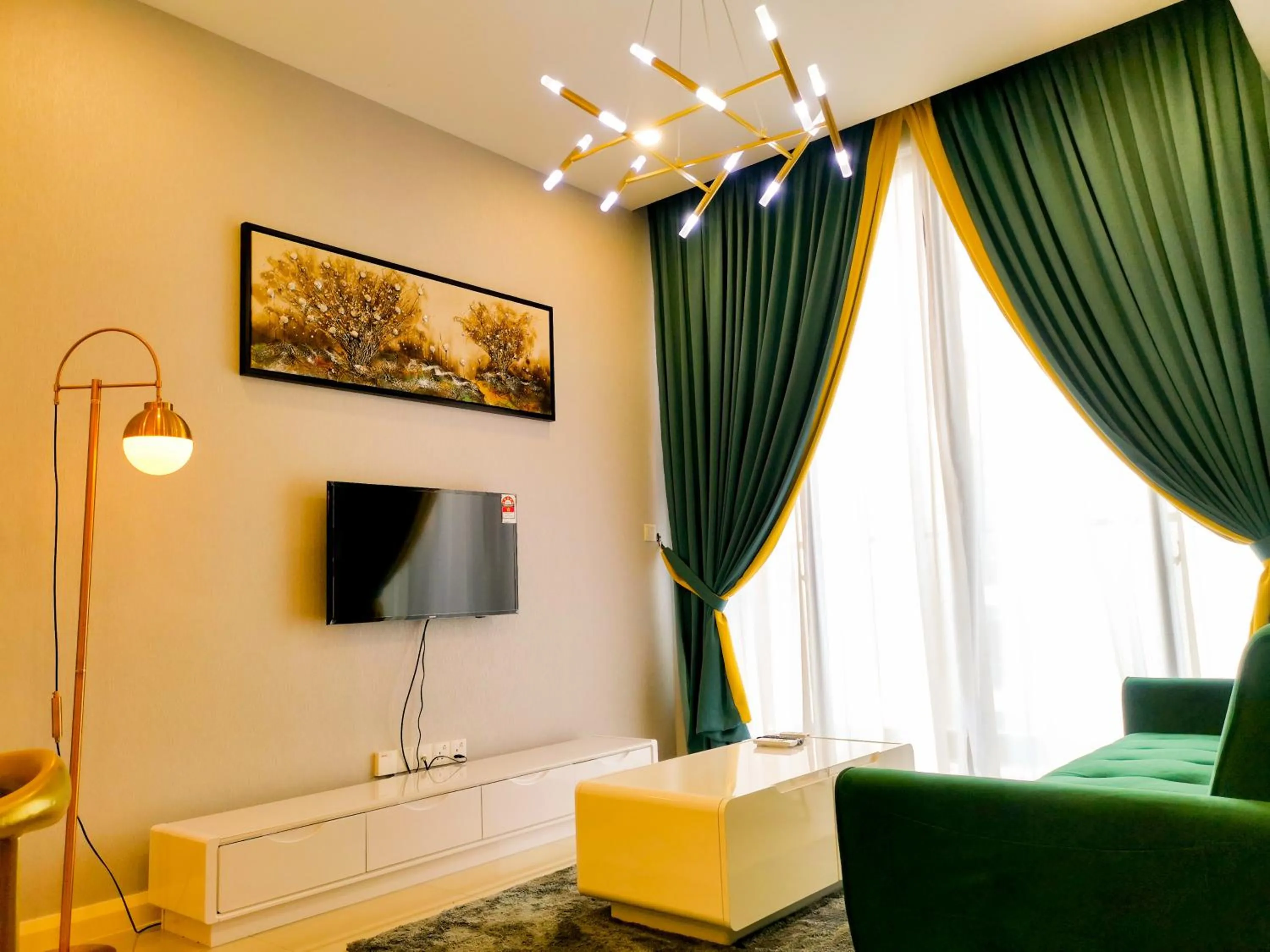 Communal lounge/ TV room in Legoland D'PRISTINE Apartment By TGP