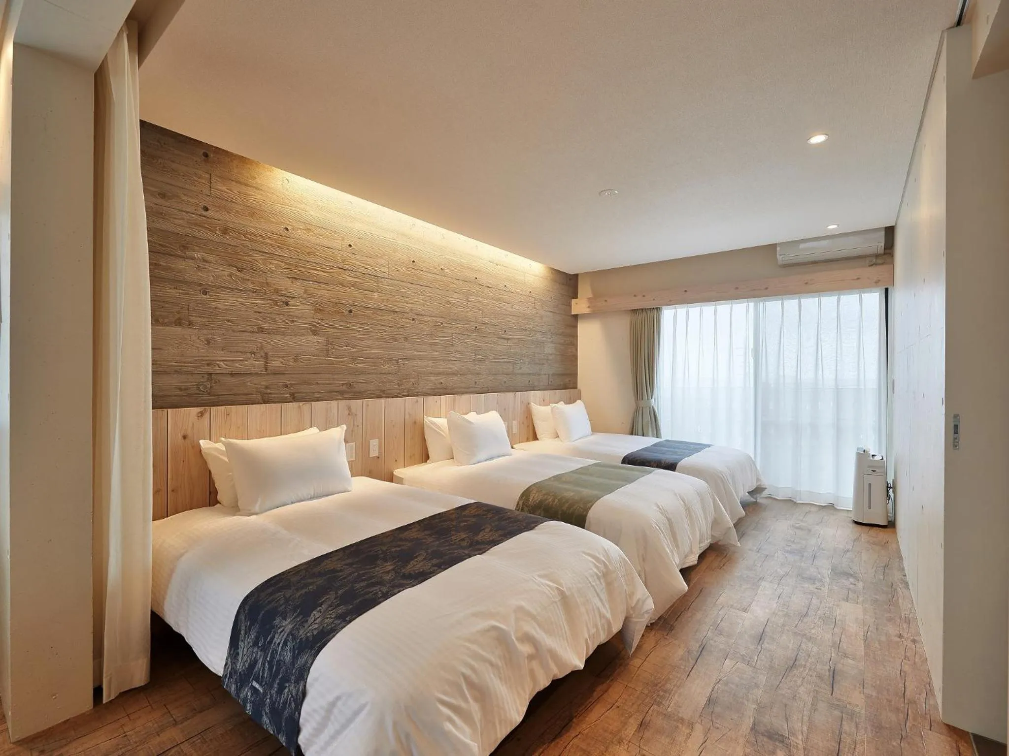 Bed in Yomitan Condhotel ND