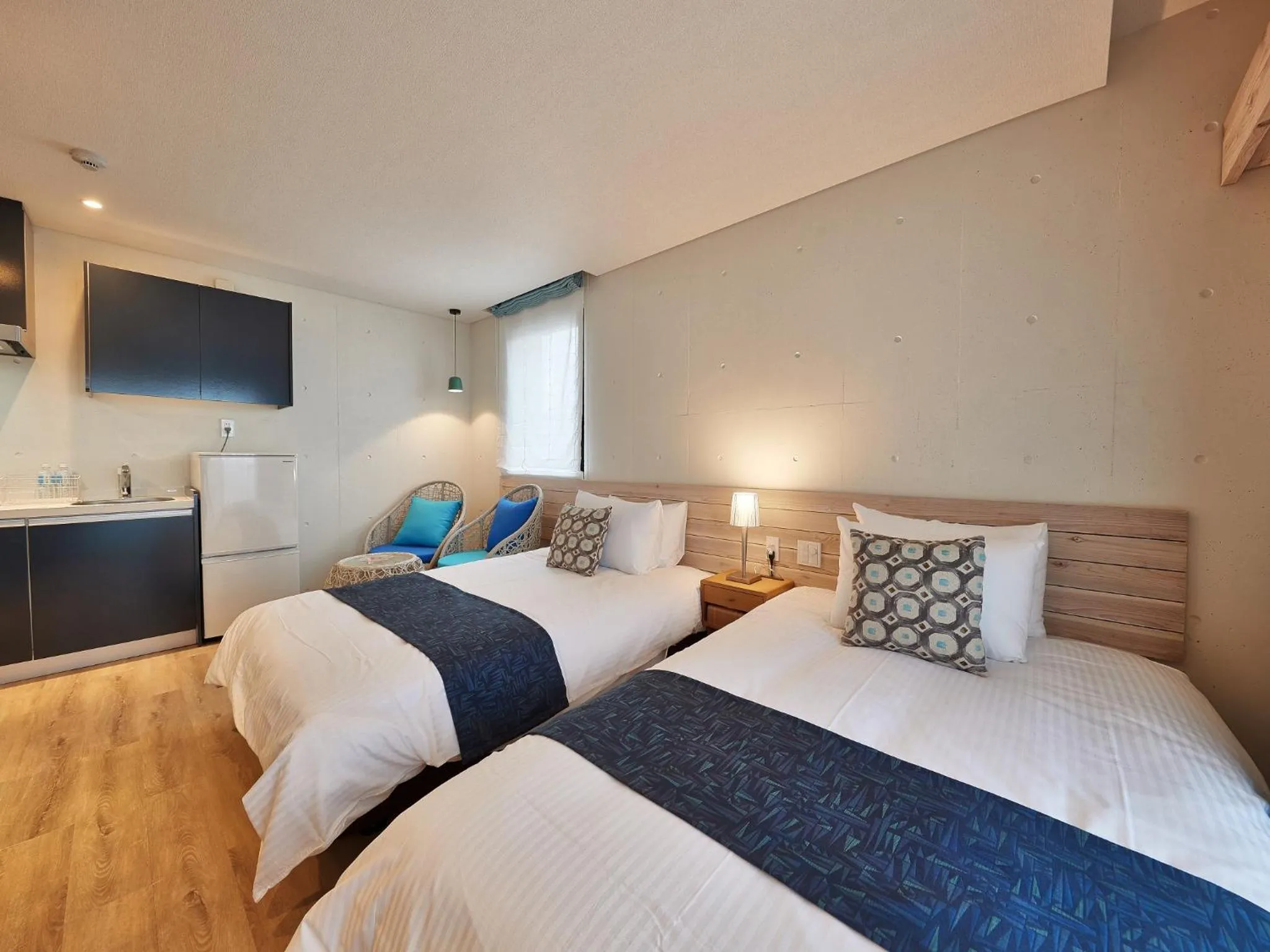 Photo of the whole room, Bed in Yomitan Condhotel ND