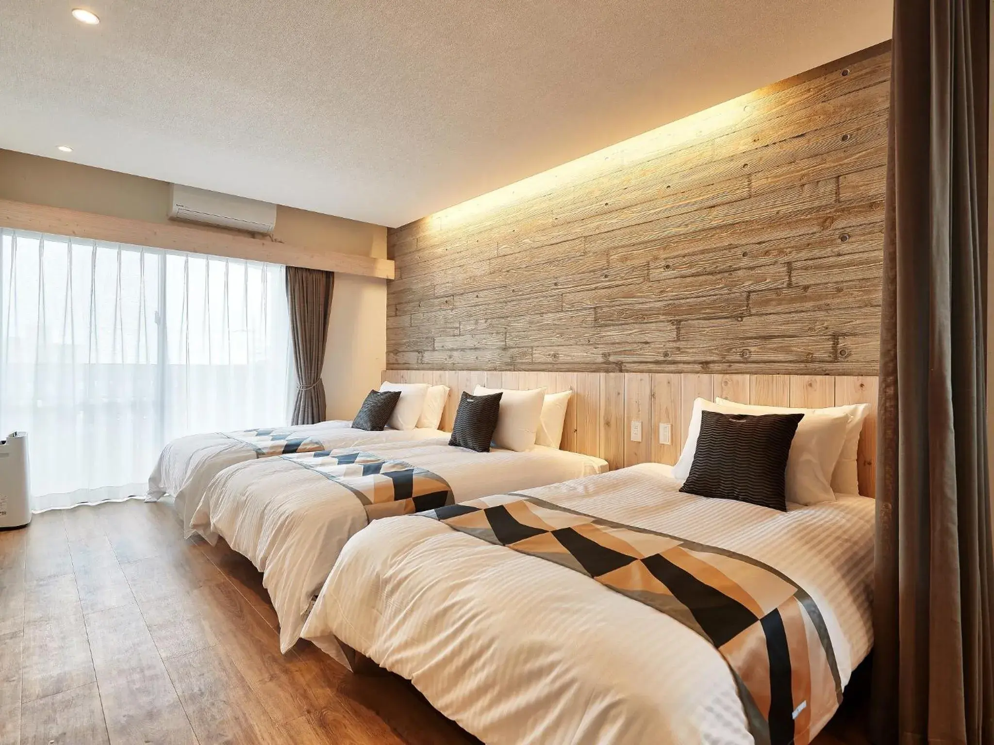 Triple Room in Yomitan Condhotel ND Triple Room in Yomitan Condhotel ND