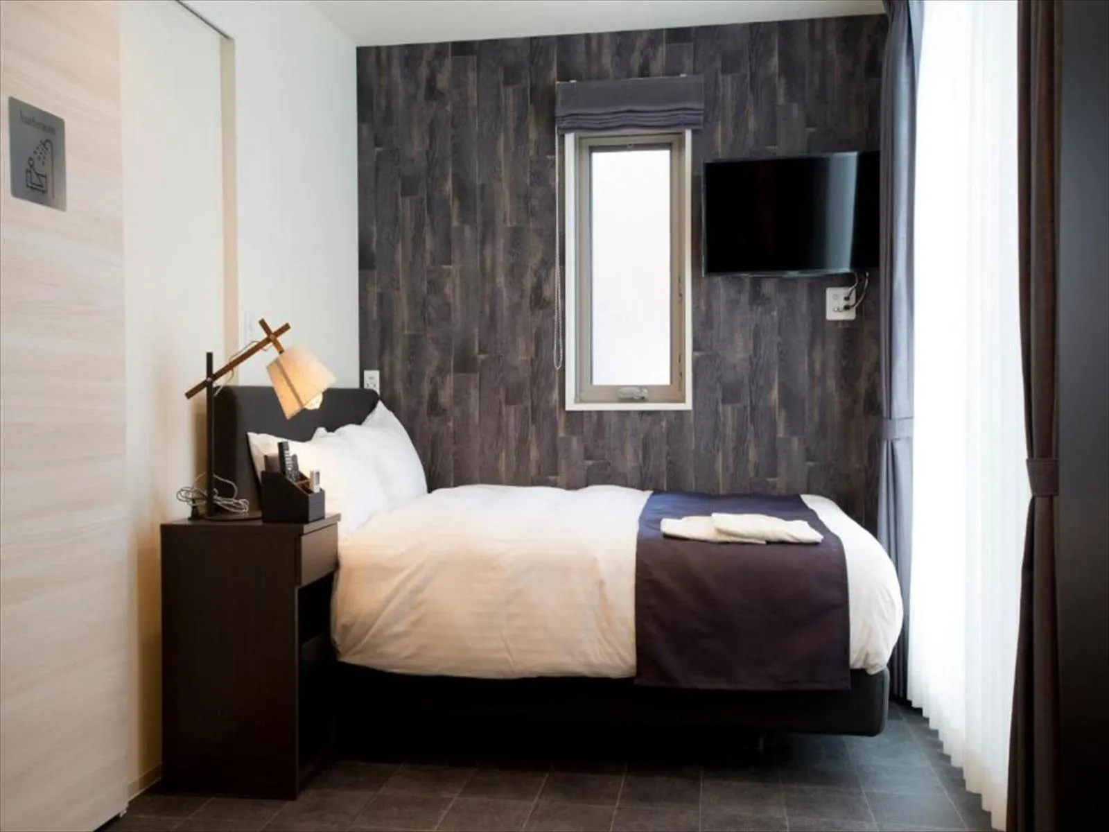 Bed in CHA-AN HOTEL UENO