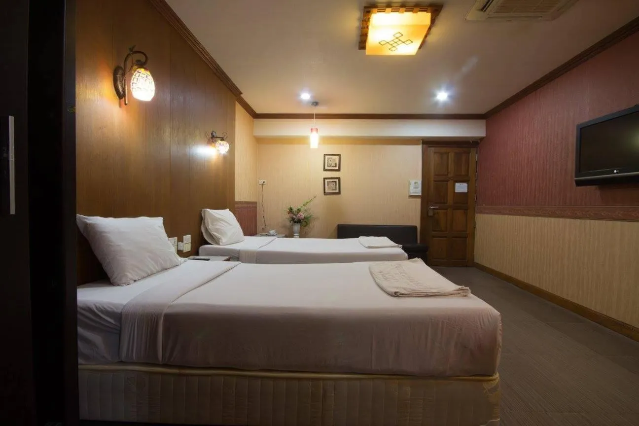 Bed in Khon Kaen Ruenrom Hotel