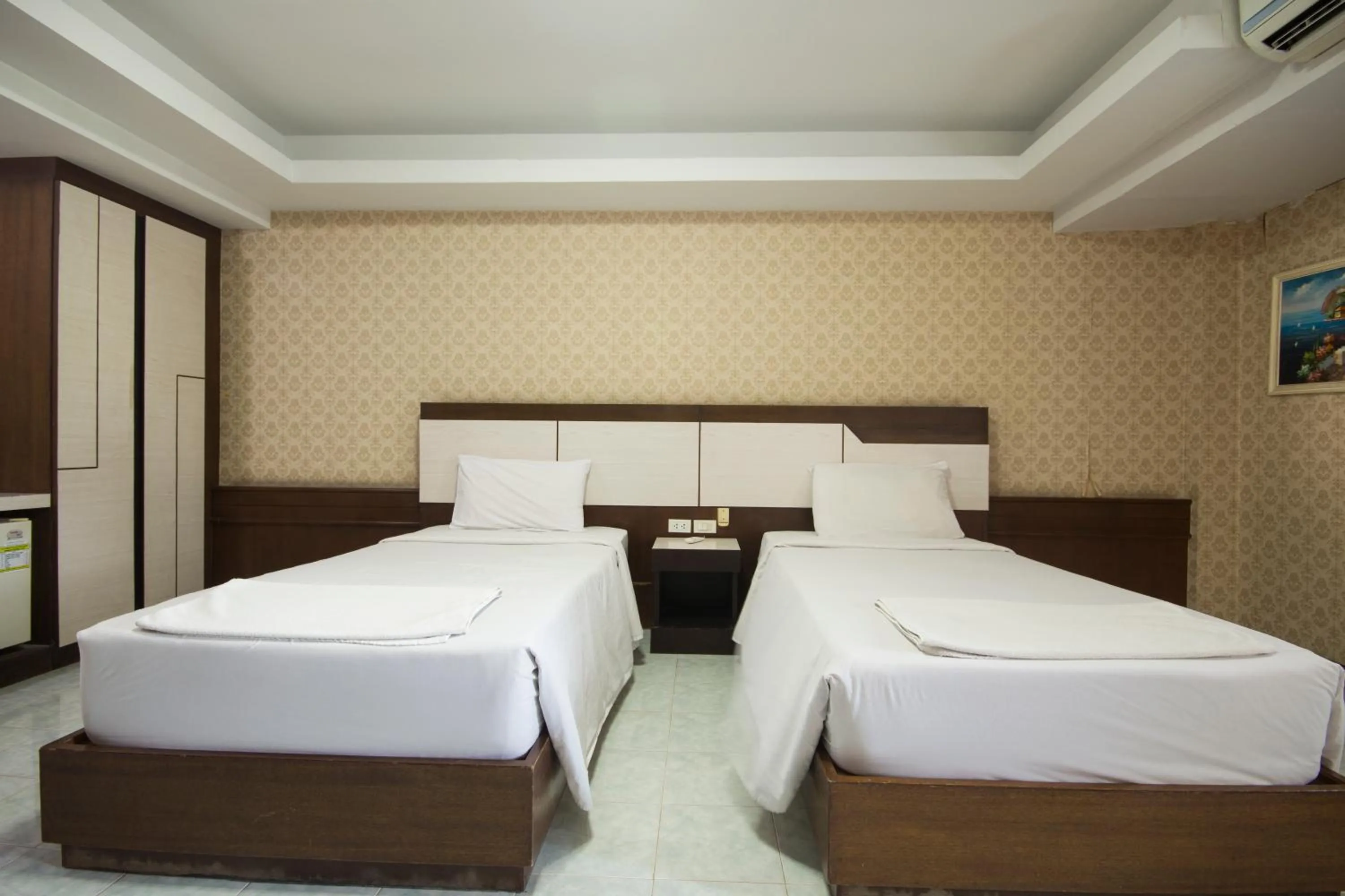 Bed in Khon Kaen Ruenrom Hotel